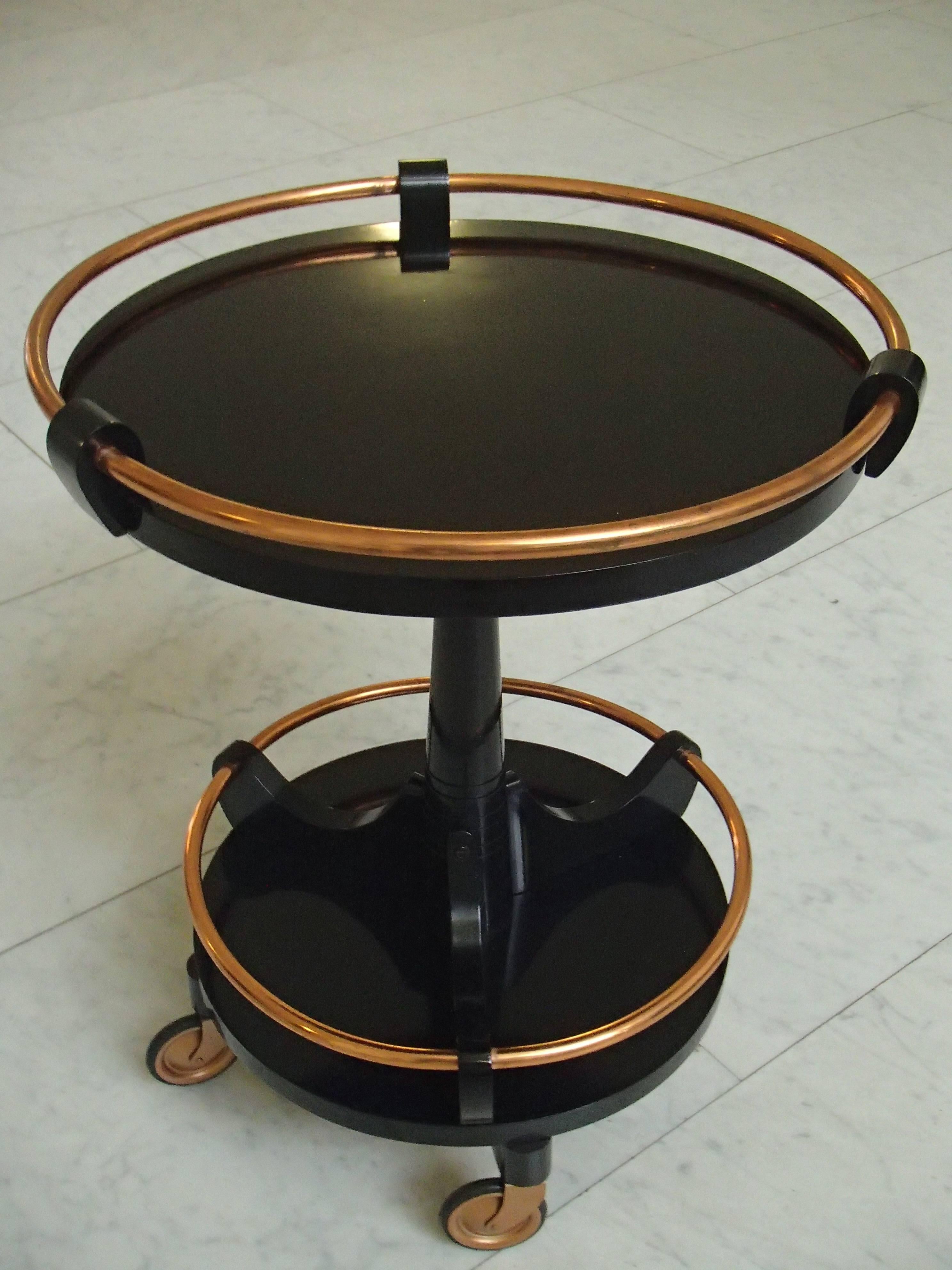 Art Deco round small bar drinking trolley black and copper.