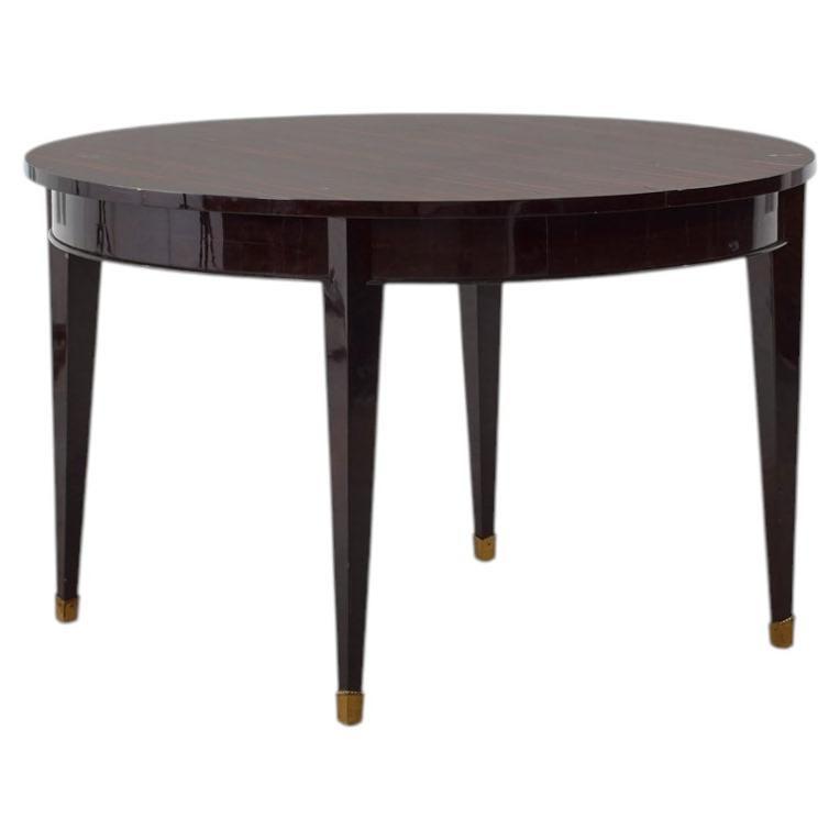 Art Deco round table in Macassar ebony veneer - France, 1920s