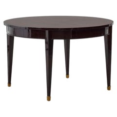 Art Deco round table in Macassar ebony veneer - France, 1920s
