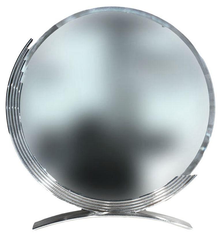 This elegant Art Deco round table-top mirror features a demilune frame which rests on an arched base both of which are in chrome. The beveled mirror was re-chromed and re-mirrored with care in Los Angeles in the 1970s.

Dimensions: 20