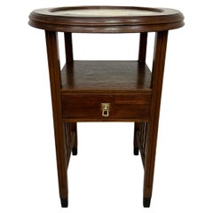 Art deco round table with brass top
