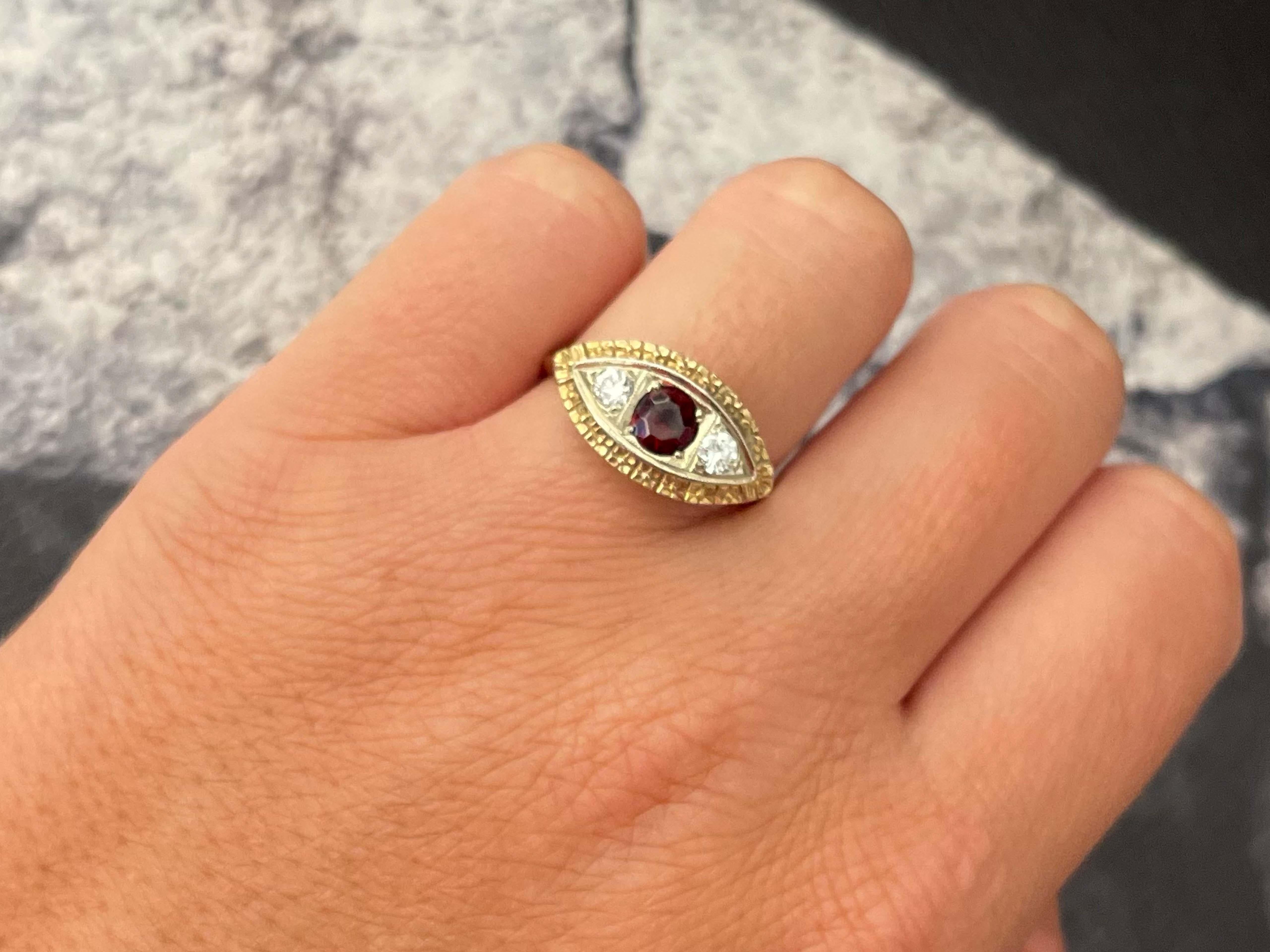 
Item Specifications:

Metal: 14K Yellow Gold

Style: Statement Ring

Ring Size: 9 (resizing available for a fee)

Total Weight: 3.9 Grams

Gemstone Specifications:

Gemstones: 1 rubellite garnet

Garnet Carat Weight: 0.45 carats

Diamond Carat