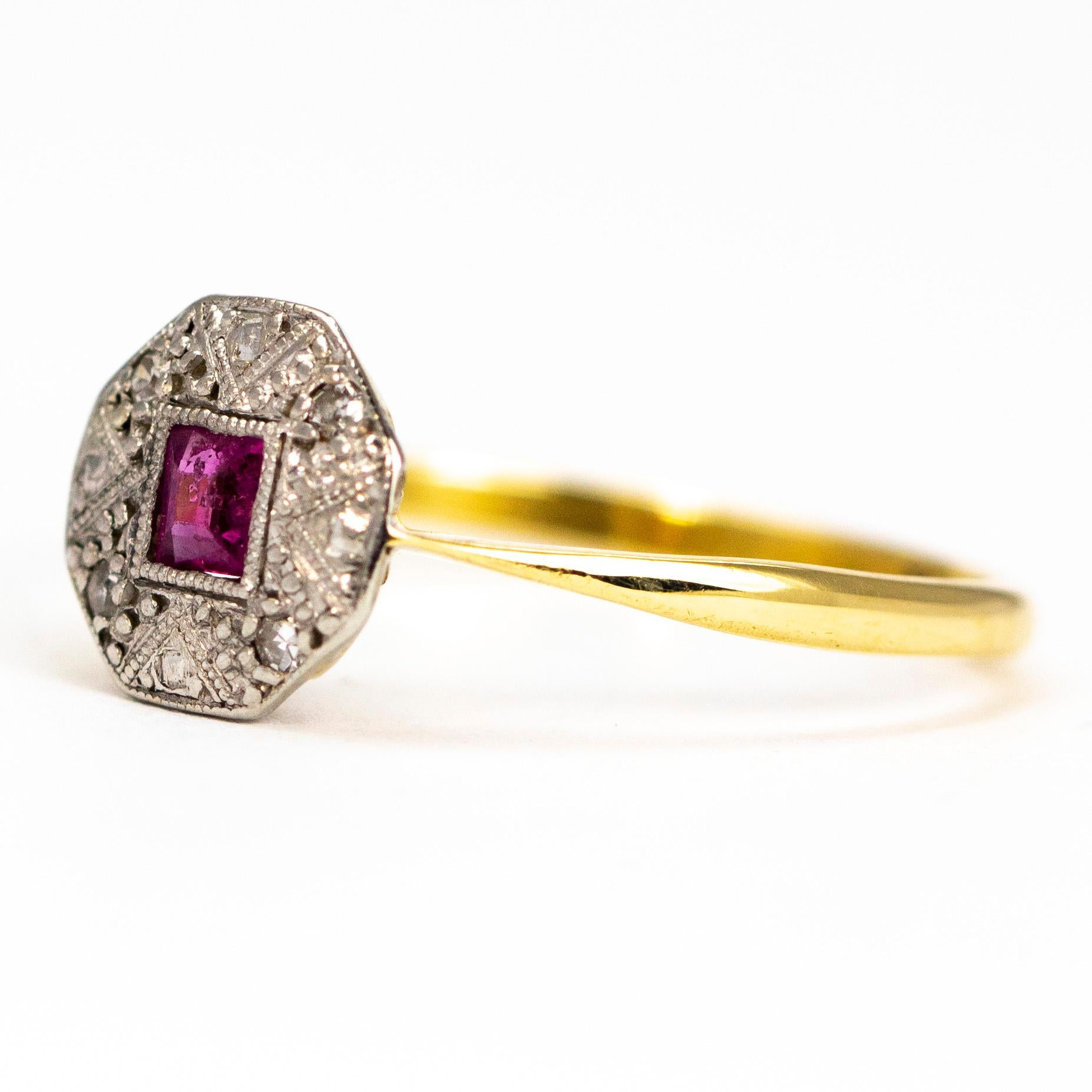 This Art Deco panel ring holds a square cut central ruby measuring 25pts and is surrounded by a highly decorative platinum panel with small diamonds at within it to add that lovely bit of sparkle.

Ring Size: O 1/2 or 7 1/4
Panel Diameter: