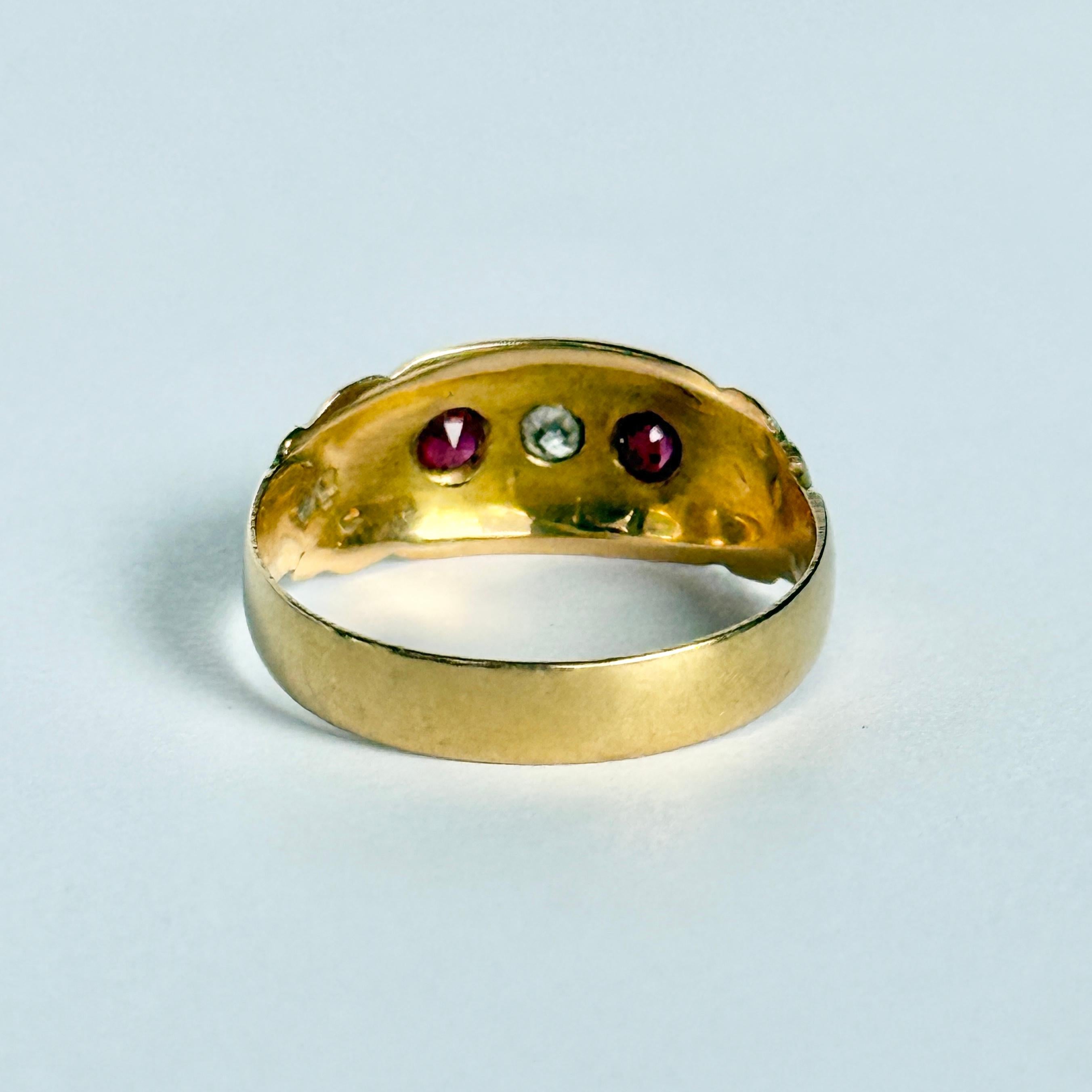 Round Cut Art Deco Ruby and Diamond 18 Carat Gold Three-Stone Star Setting Ring For Sale