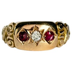 Art Deco Ruby and Diamond 18 Carat Gold Three-Stone Star Setting Ring