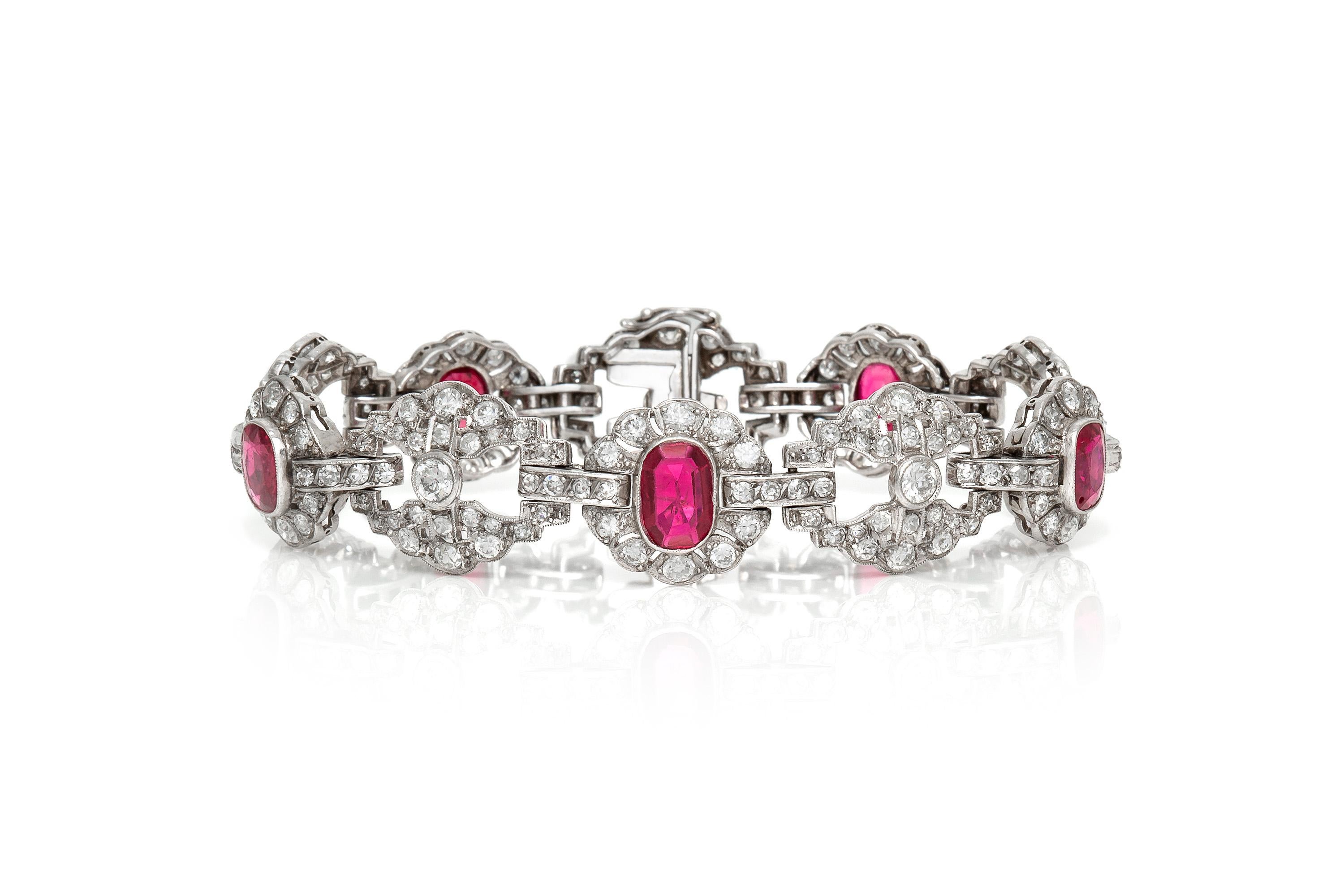 Art Deco platinum bracelet features 8.50 carats of ruby and 10.00 carats of round cut diamonds. Circa 1930. 