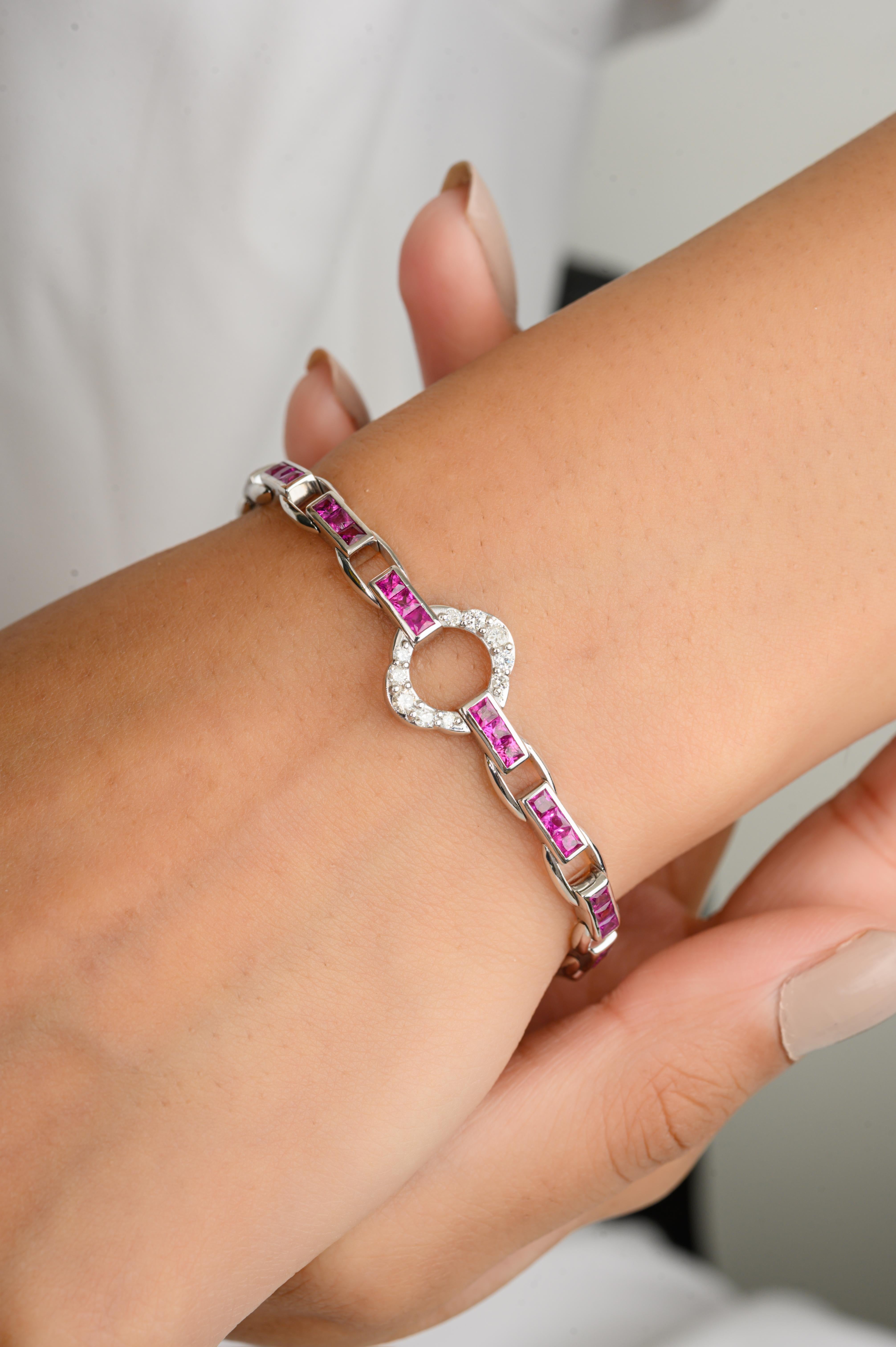 This Art Deco style Ruby and Diamond Clover Tennis Bracelet Gift for Wedding in 14K gold showcases endlessly sparkling natural ruby, weighing 3.77 carat and diamonds weighing 0.62 carats. It measures 7.5 inches long in length. 
Ruby improves mental