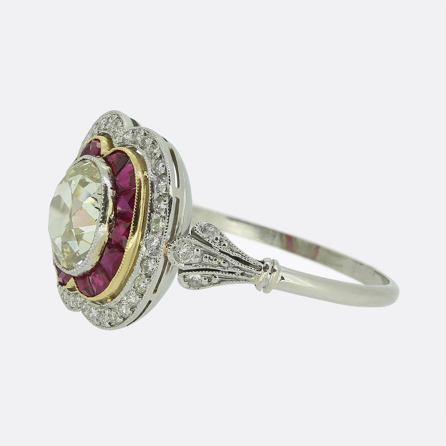 Here we have a delightful ruby and diamond cluster ring taken from a time when the Art Deco style was continuing to revolutionise the world of design. This piece has been crafted from platinum and features a centralised oval faceted old cut diamond.