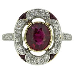 Bague grappe Art déco en rubis et diamants