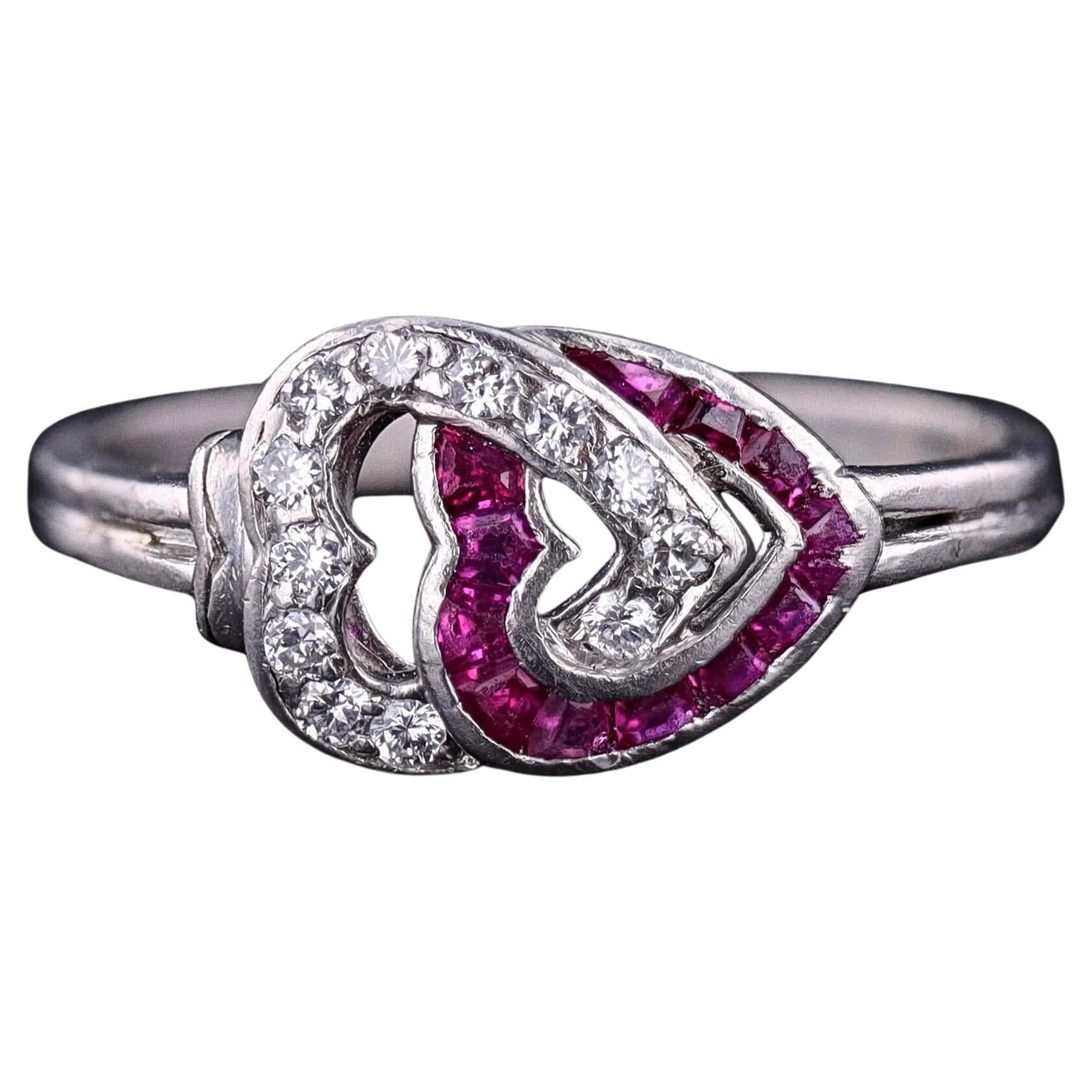 Art Deco Ruby and Diamond Entwined Hearts Ring of Platinum