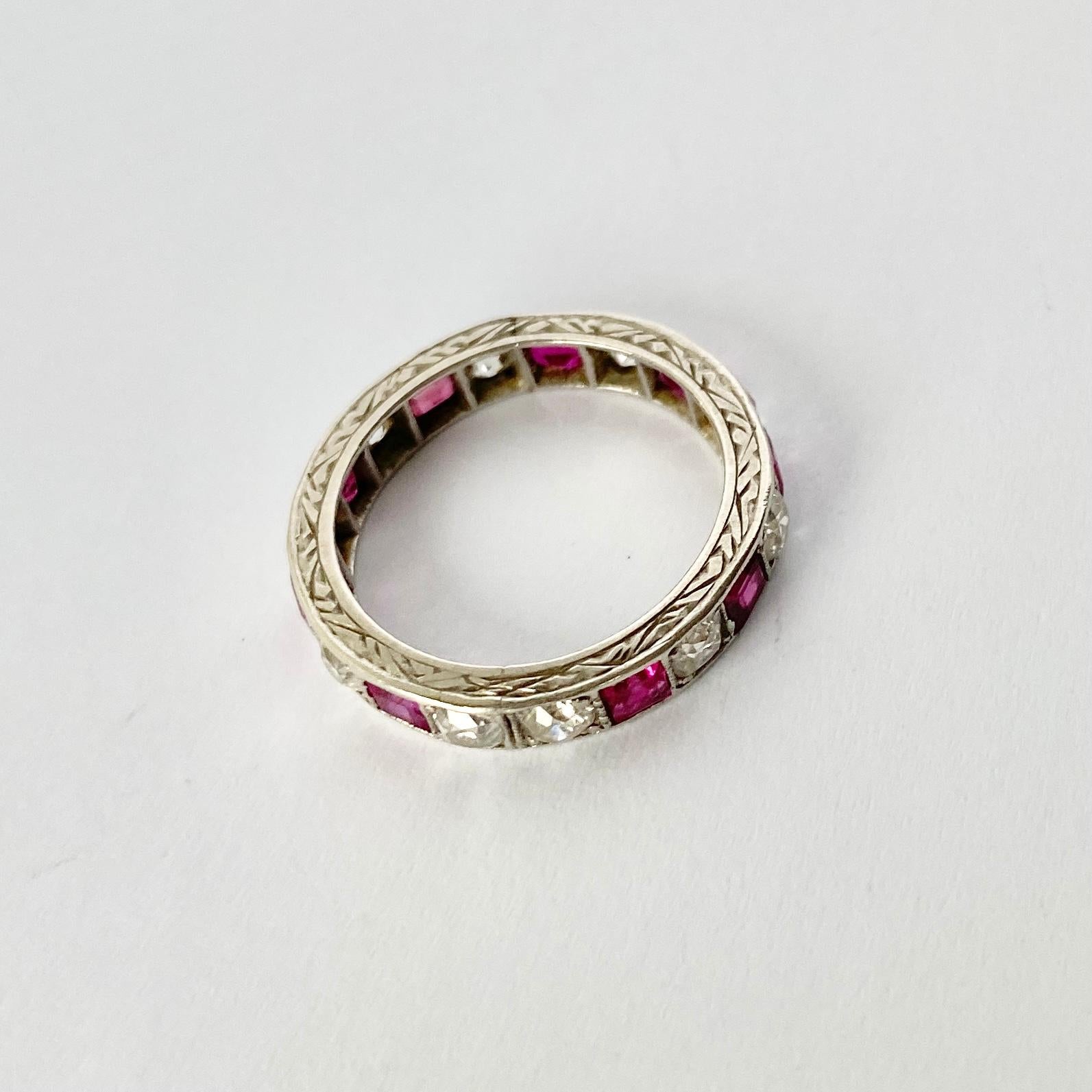 This full eternity ring is absolutely stunning! The ring boasts a total of 1ct of round cut diamonds and also hold a total of 1.3ct square cut rubies. The stones are set alternately apart from one set of double diamonds. The side of the band has