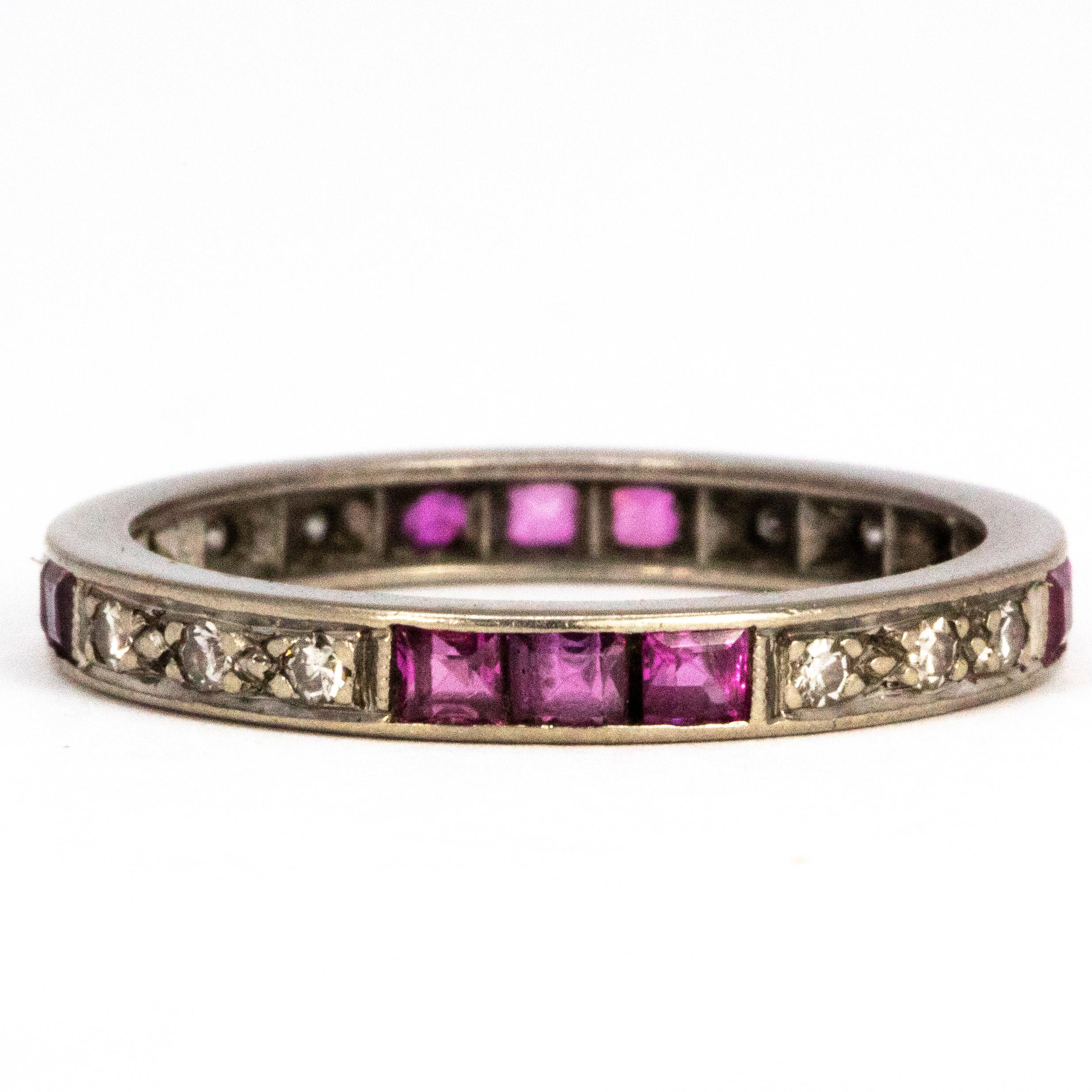 The 2pt rubies in this ring are square cut and are set in threes. The diamonds measure 3pts each and are also set in threes which breaks the colour up beautifully. 

Ring Size: N 1/2 or 7 
Band Width: 2mm 