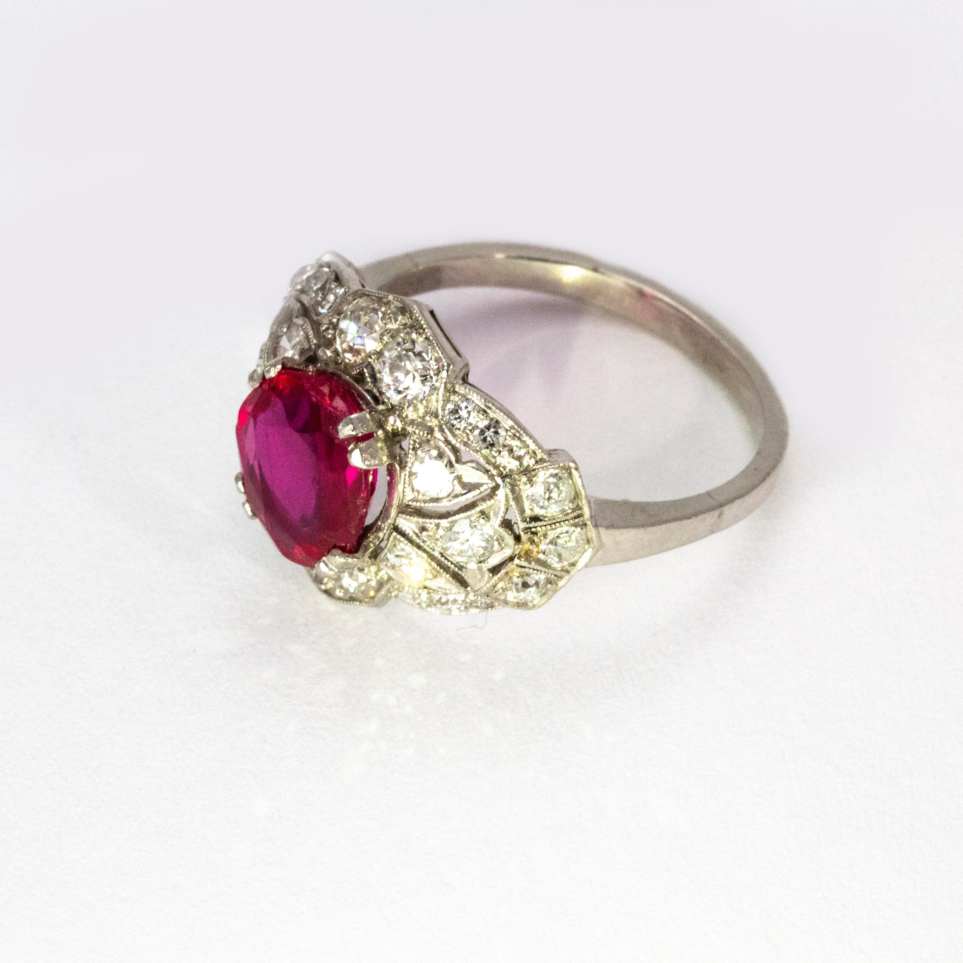 An incredible Art Deco ring centrally set with a fine certified 1.45 carat ruby. The surroundings of the central stone are encrusted with white old European cut diamonds. Total diamond weight certified 95 points, H colour and SI-2 clarity. Modelled