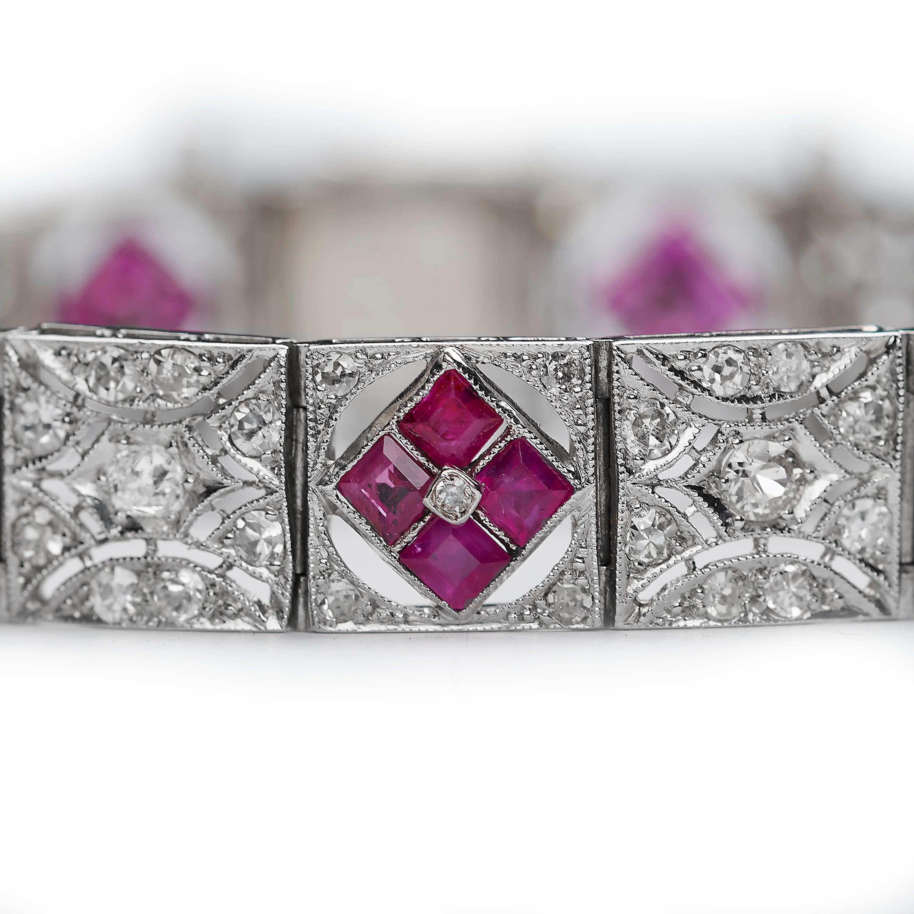 An Art Deco ruby and diamond bracelet, with alternating square plaques set with groups of four square-cut rubies, in an openwork mount, with old-cut and eight-cut diamonds set in each corner and old-cut diamonds in an openwork mount, with millegrain