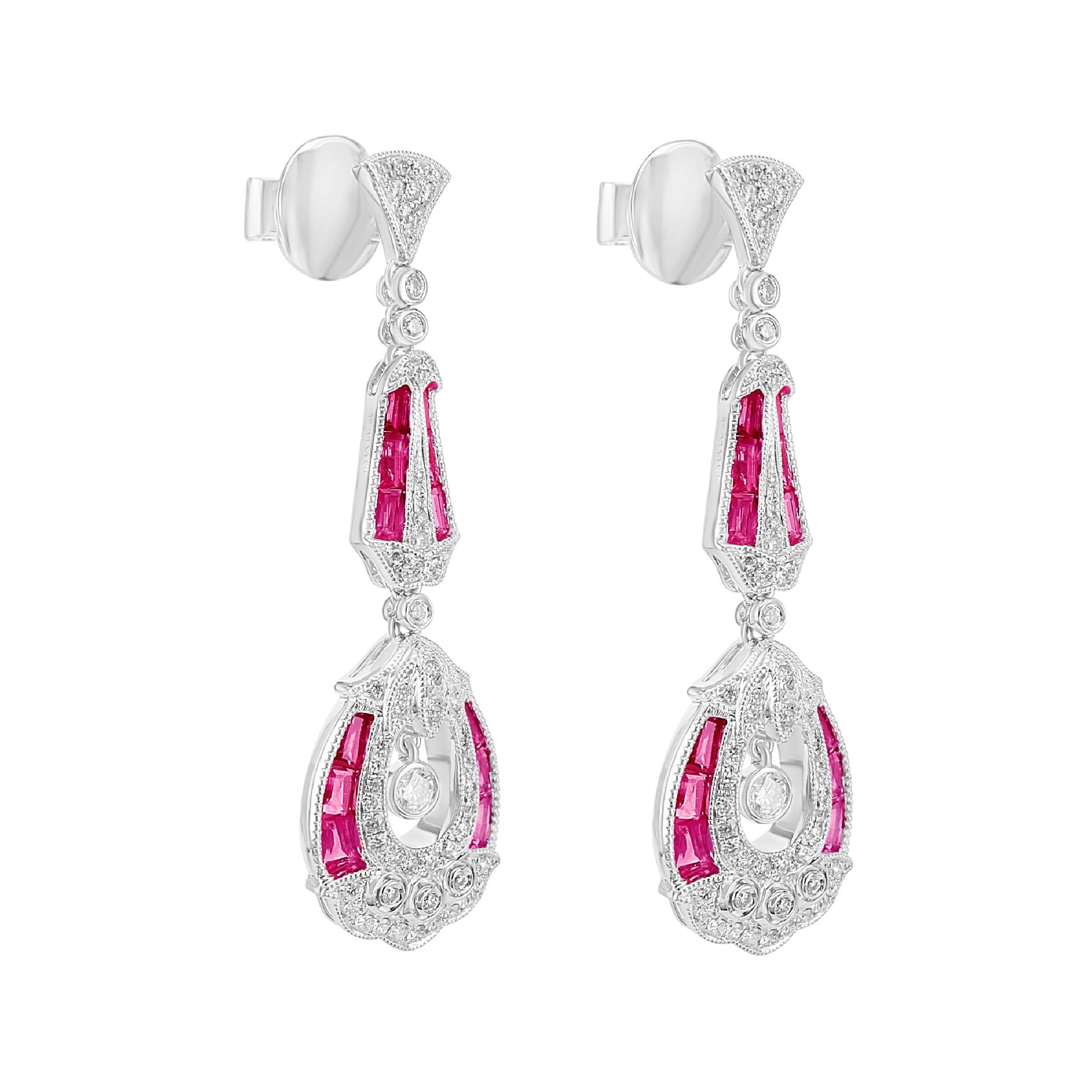 A lovely mix of 2.04 carat of specially cut vivid red ruby and 0.76 carats of white round brilliant diamond are accented together on this art deco style earring. The earring has been inspired by the architecture of France during the 1910-1920