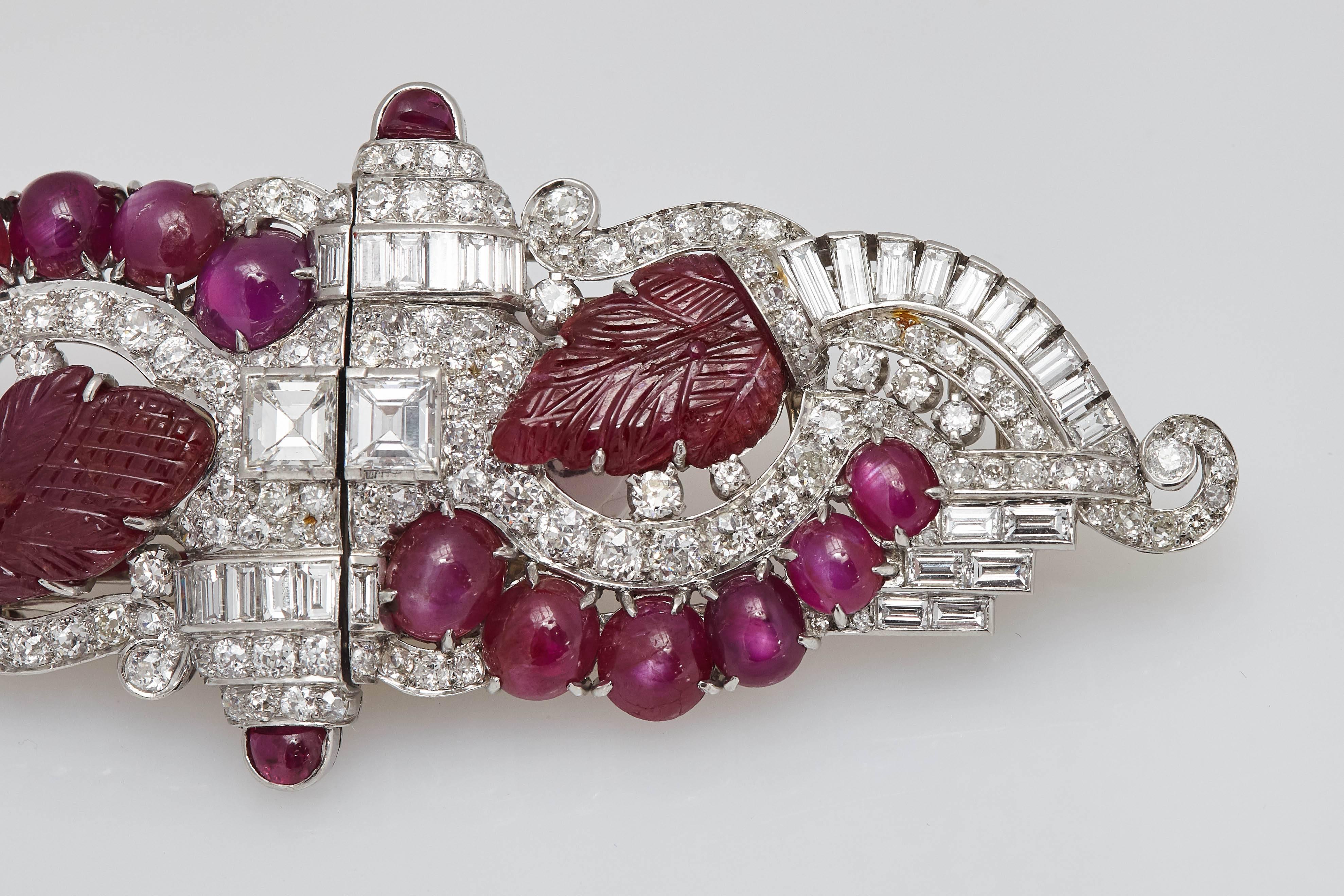 A beautiful pair of Art Deco double clips (detachable), with natural Burmese rubies and mixed cut diamonds, mounted on platinum. Circa 1925