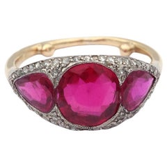 Art Deco ruby diamond ring in 18 karat gold and platinum, synthetic rubies