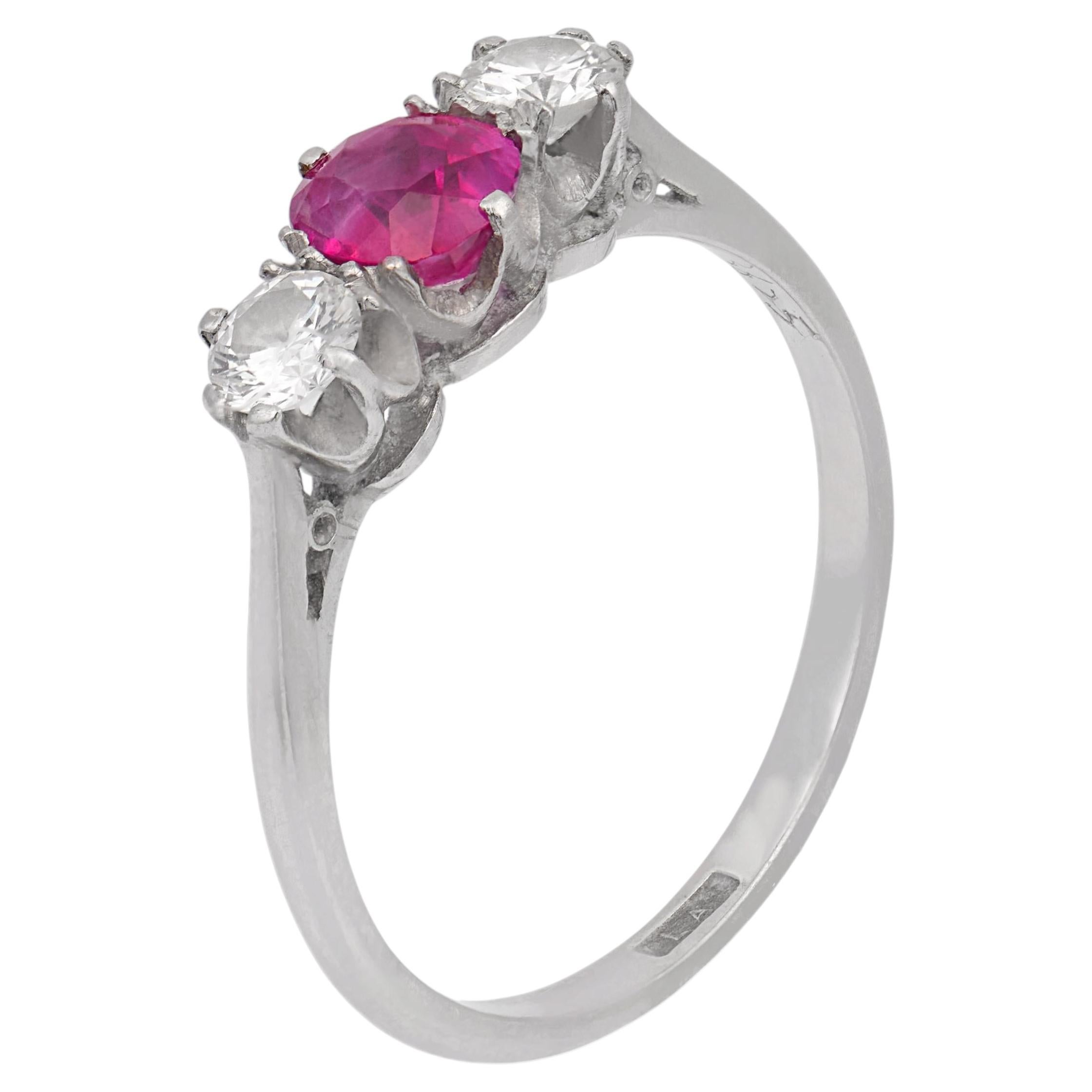 Art Deco ruby diamond three stone platinum ring