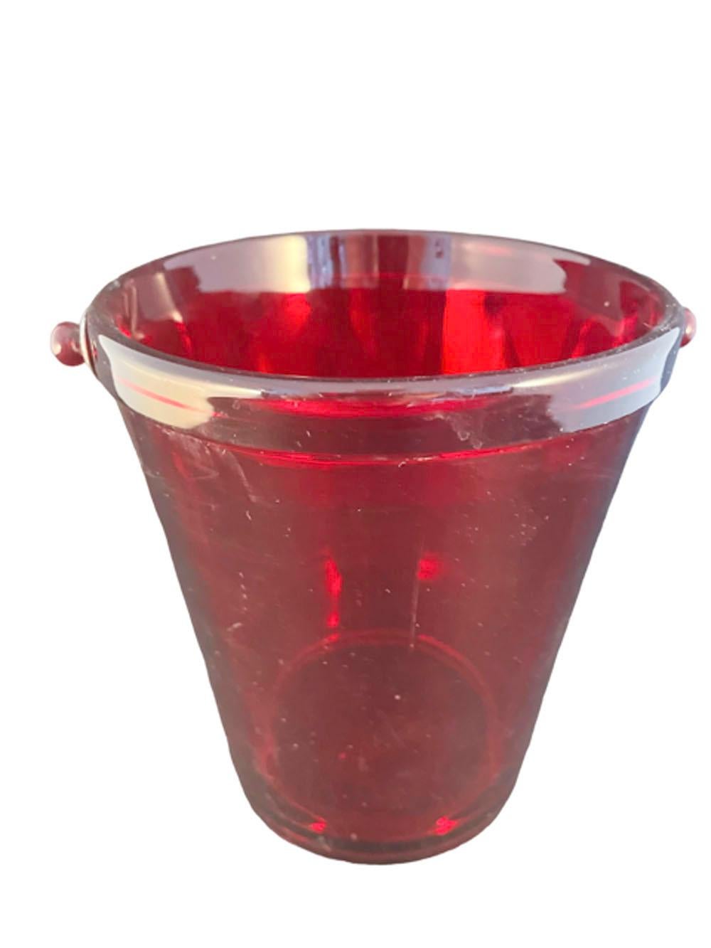 Art Deco, Fostoria Glass Co., ruby red pail form Ice bucket with chromed metal bail handle,

NOTE: The rim is not silvered, it is all red. That is reflection in the images.