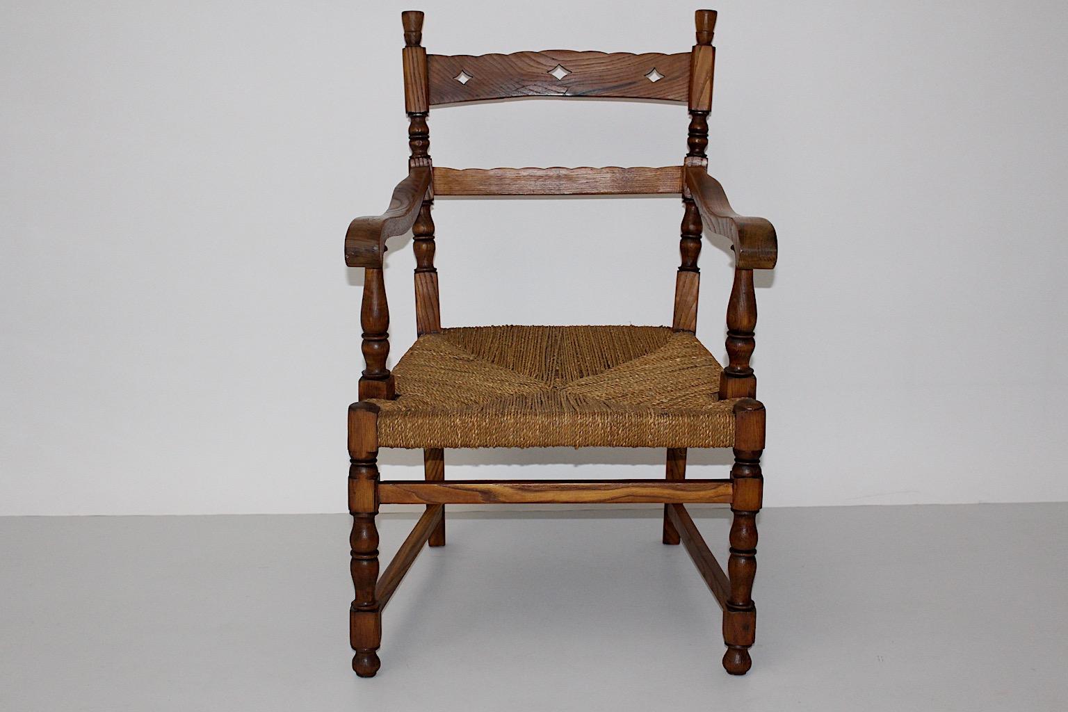 Art Deco Rustic vintage armchair from ash designed and executed in Vienna, circa 1925 design attributed to Oskar Strnad.
This beautiful armchair shows a frame from solid turned ash wood in a warm brown color also the seat features a sisal cord