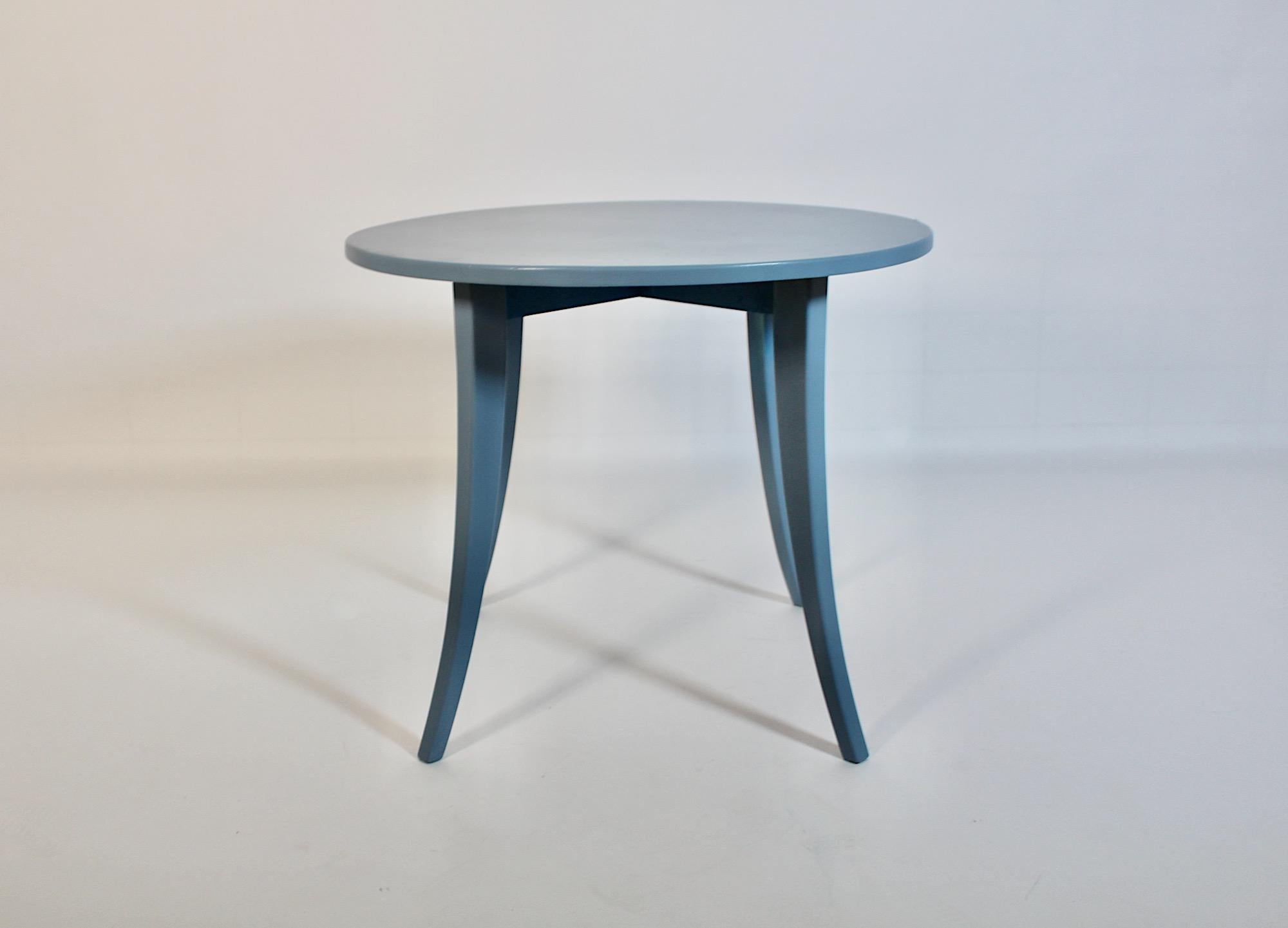 Art Deco Rustic vintage circular coffee table from solid spruce pastel blue lacquered, design attributed to Josef Frank, 1930s Austria.
A fantastic coffee table in circular shape repainted in original color 
pastel blue, with four ( 4 ) feet.
While