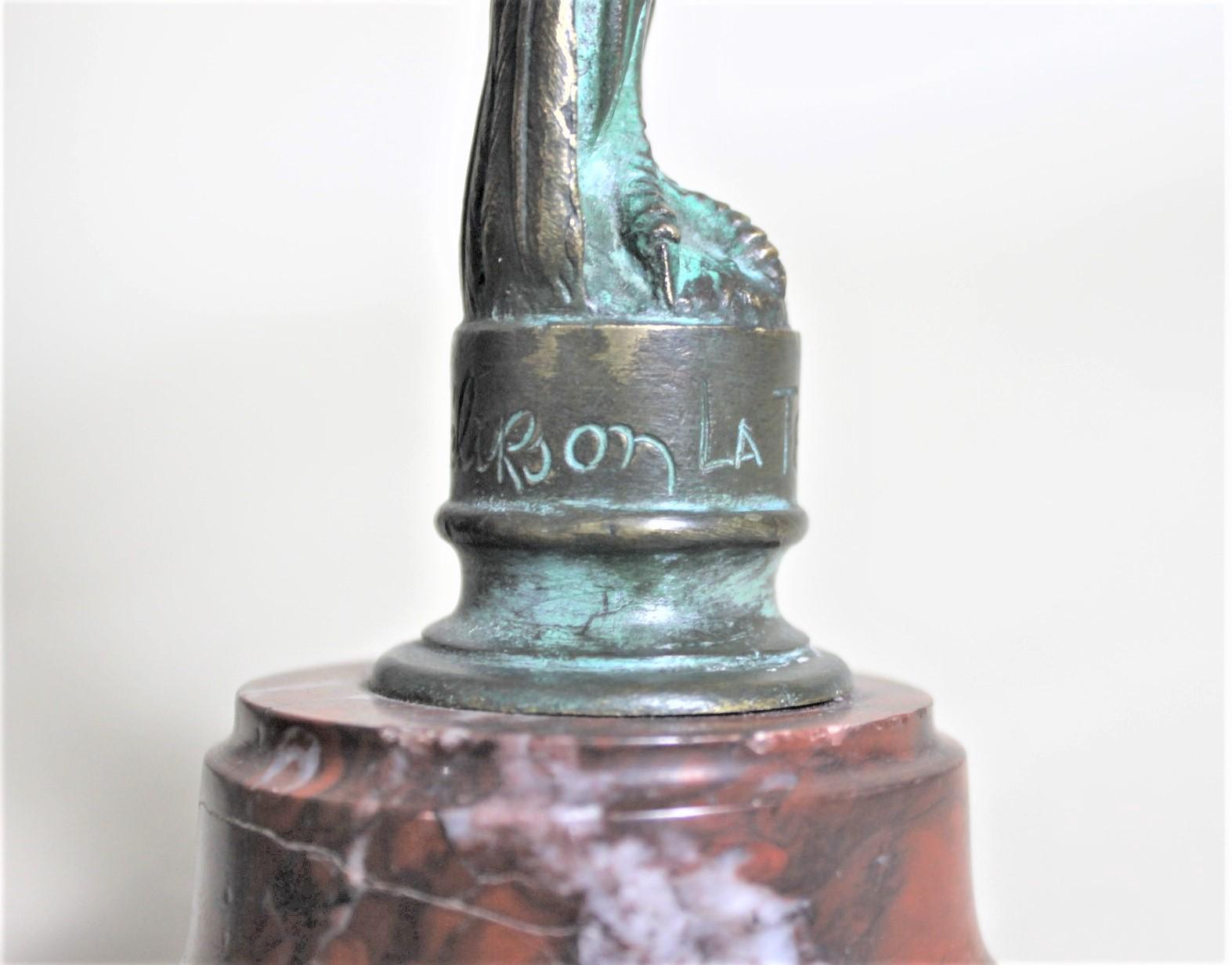 Scultura in bronzo Art Deco S. Zelikson di una donna nuda e alata 