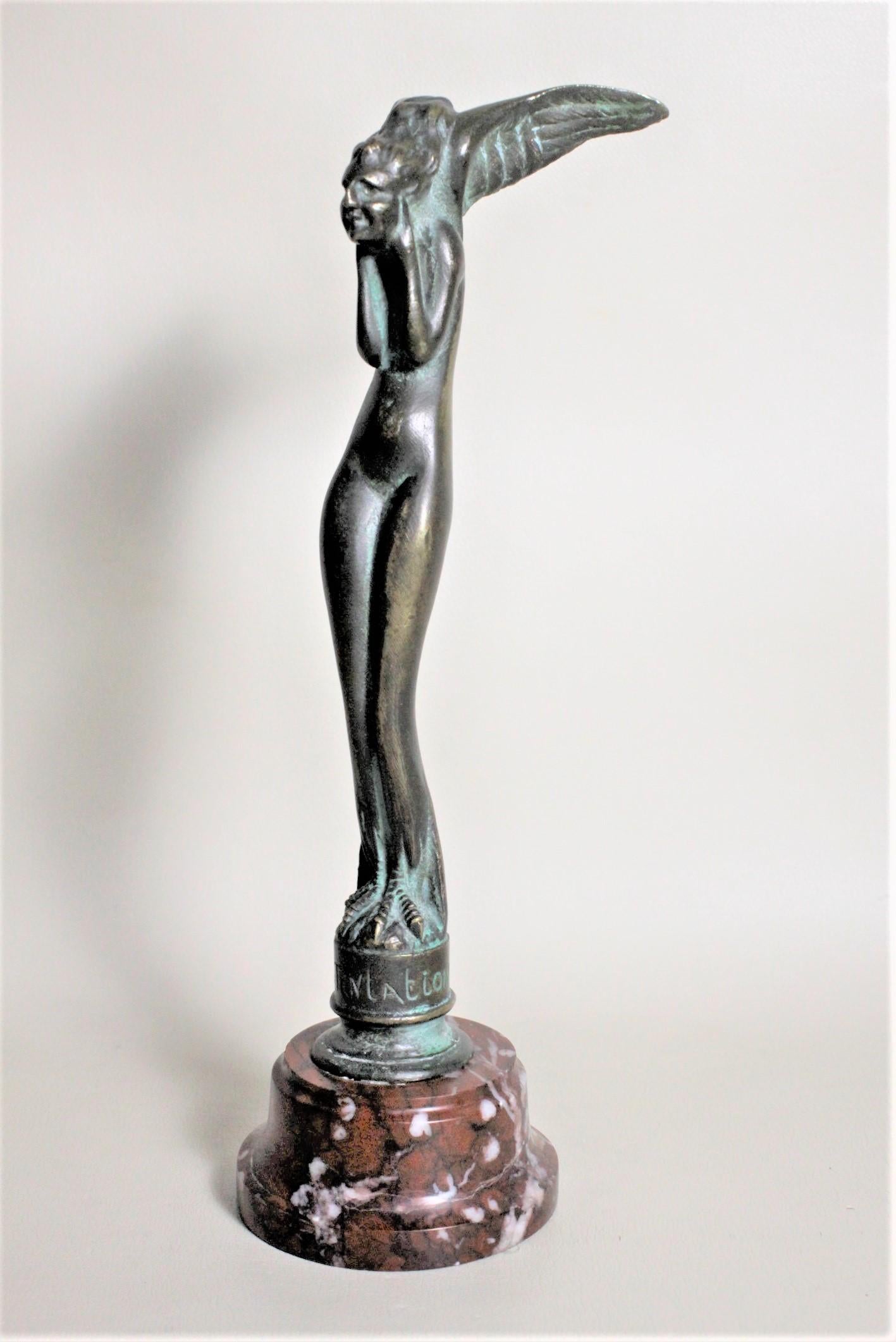 This Art Deco patinated bronze sculpture was done by Serge Zelikson of France in circa 1920 in the period Deco style. The bronze is ornately cast and depicts what some have called an angel, and is a nude female body with presumably a female head
