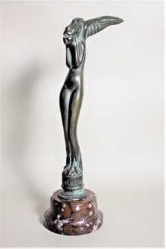 Scultura in bronzo Art Deco S. Zelikson di una donna nuda e alata "La tentazione".