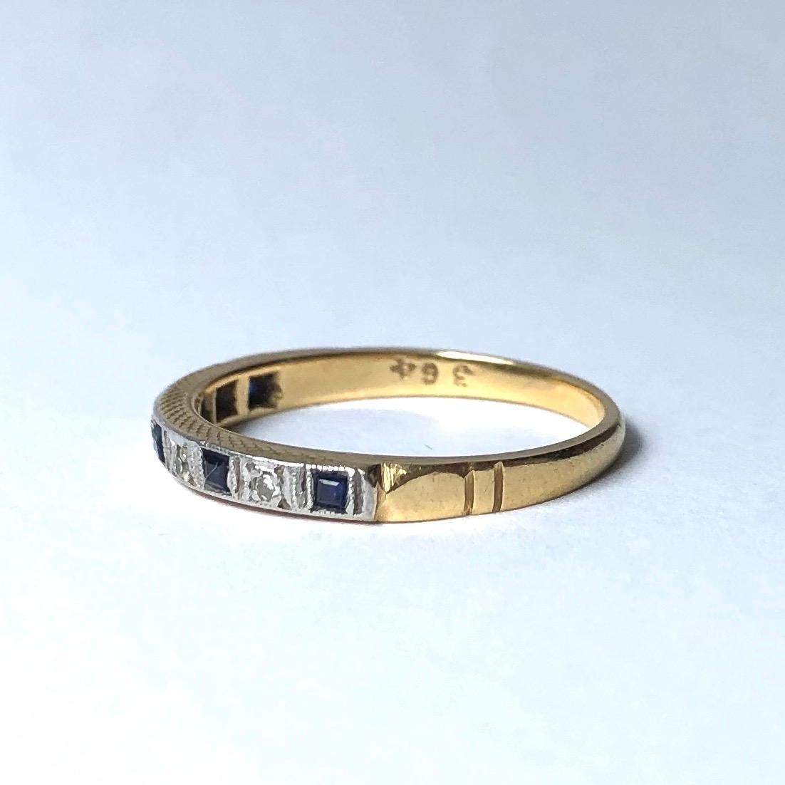 This half eternity band holds five sapphires each measuring approximately 5pts and between them sit four diamonds measuring 2pts each. 

Ring Size: P or 7 3/4
Band Width: 2mm

Weight: 2.56g
