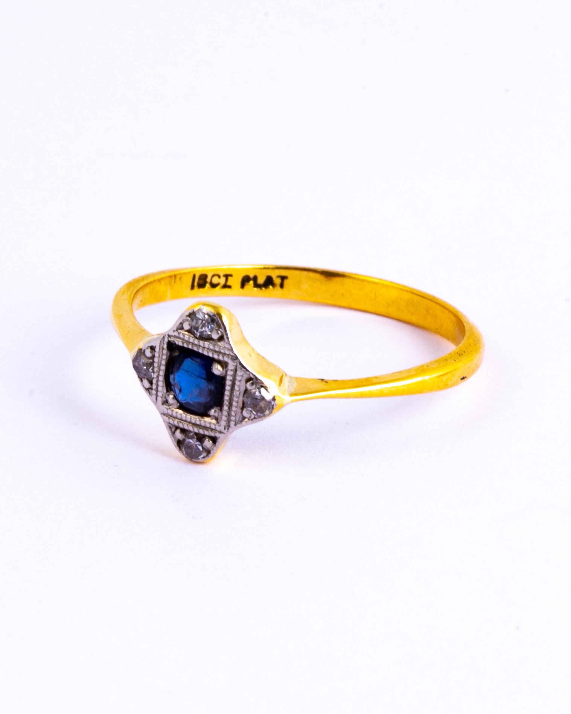 This is a wonderful example of Art Deco style, the central stone in this ring is a round cut Sapphire and surrounding it are small sparkling diamonds measuring approximately 3 pts each. The centre Sapphire measures approximately 25pts. All stones
