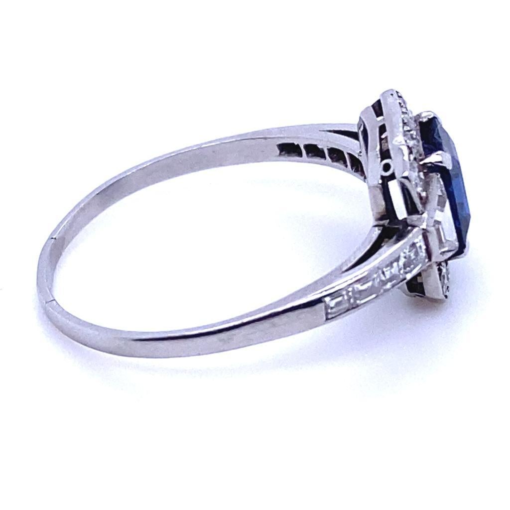 Art Deco Sapphire and Diamond Cluster Platinum Engagement Ring In Good Condition For Sale In London, GB