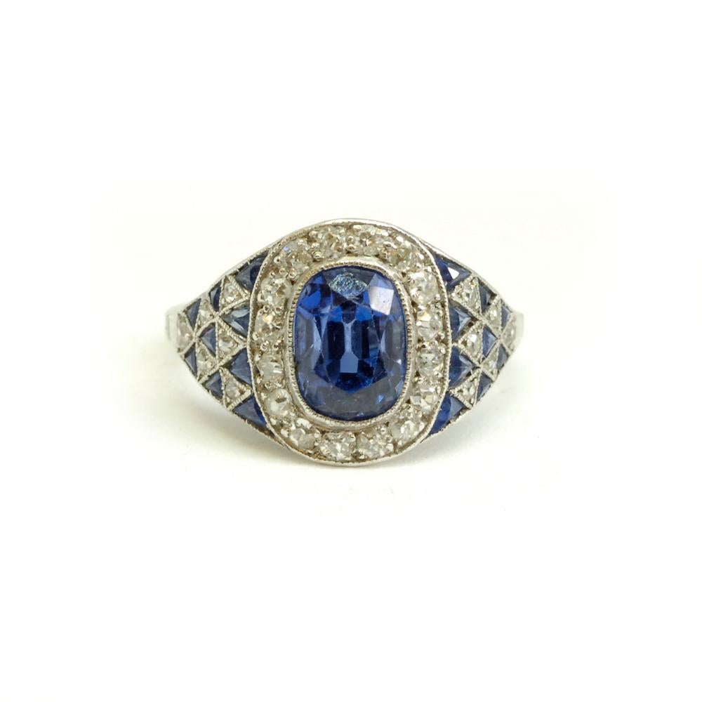 Oval Cut Art Deco Sapphire and Diamond Cluster Ring For Sale