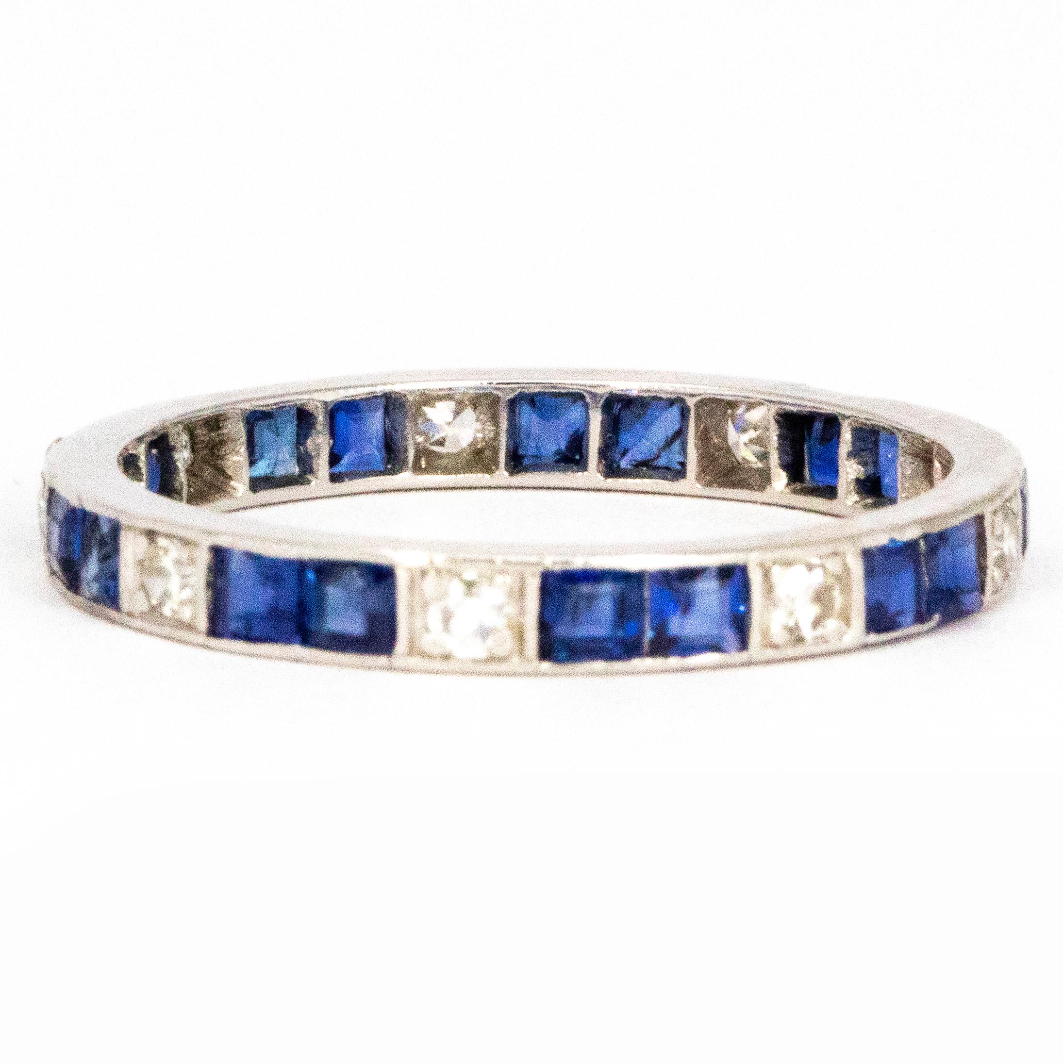 This particular eternity band has the pattern of two sapphires to one diamond which adds a great pop of colour to the band. The sapphires measure 10pts each and the diamonds measure 4pts. 

Ring Size: R or 8 1/2
Band Width: 2.5mm