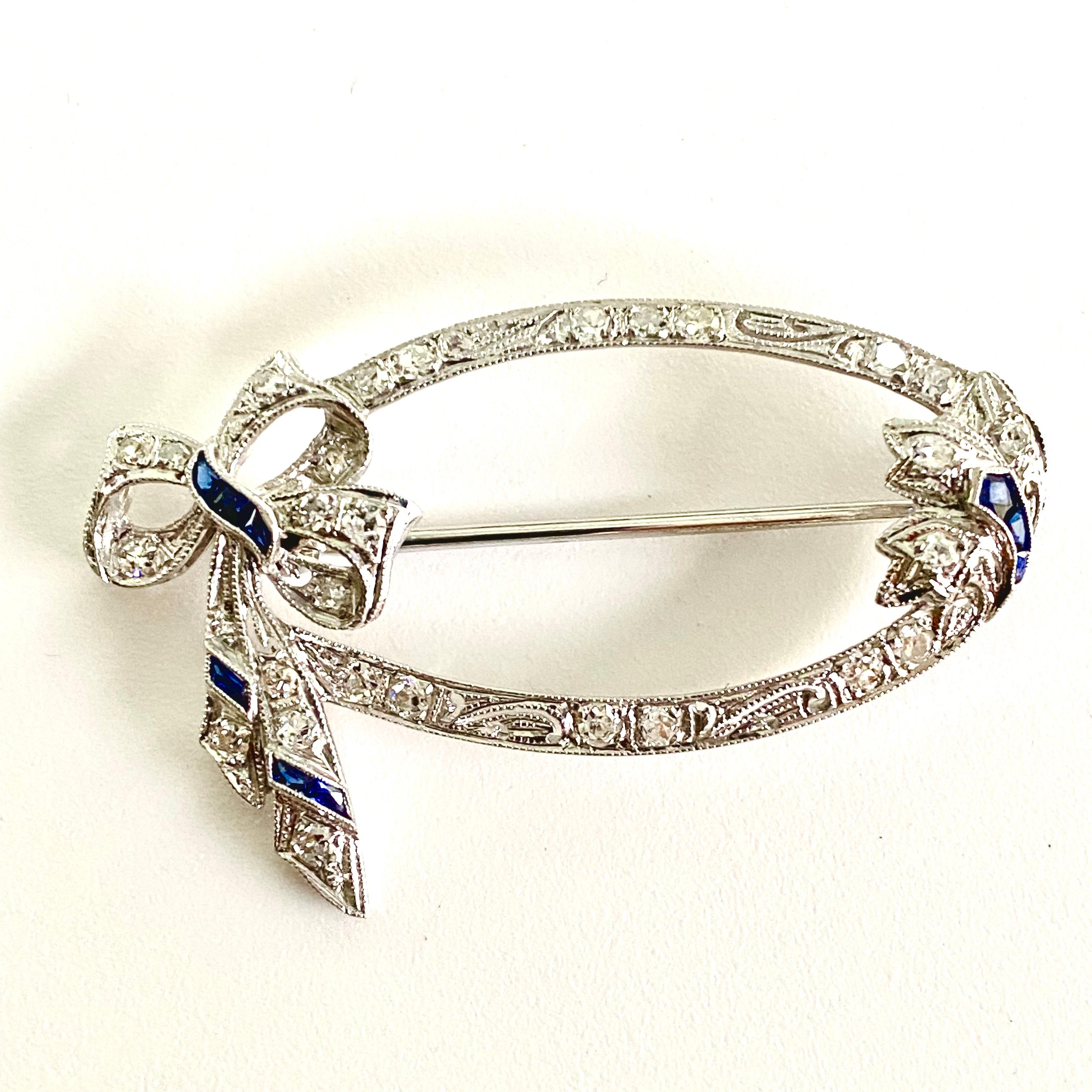 Art Deco Sapphire Diamond Platinum Hand Engraved Millgrain Bow 1.30 Inch Brooch In Good Condition For Sale In New York, NY