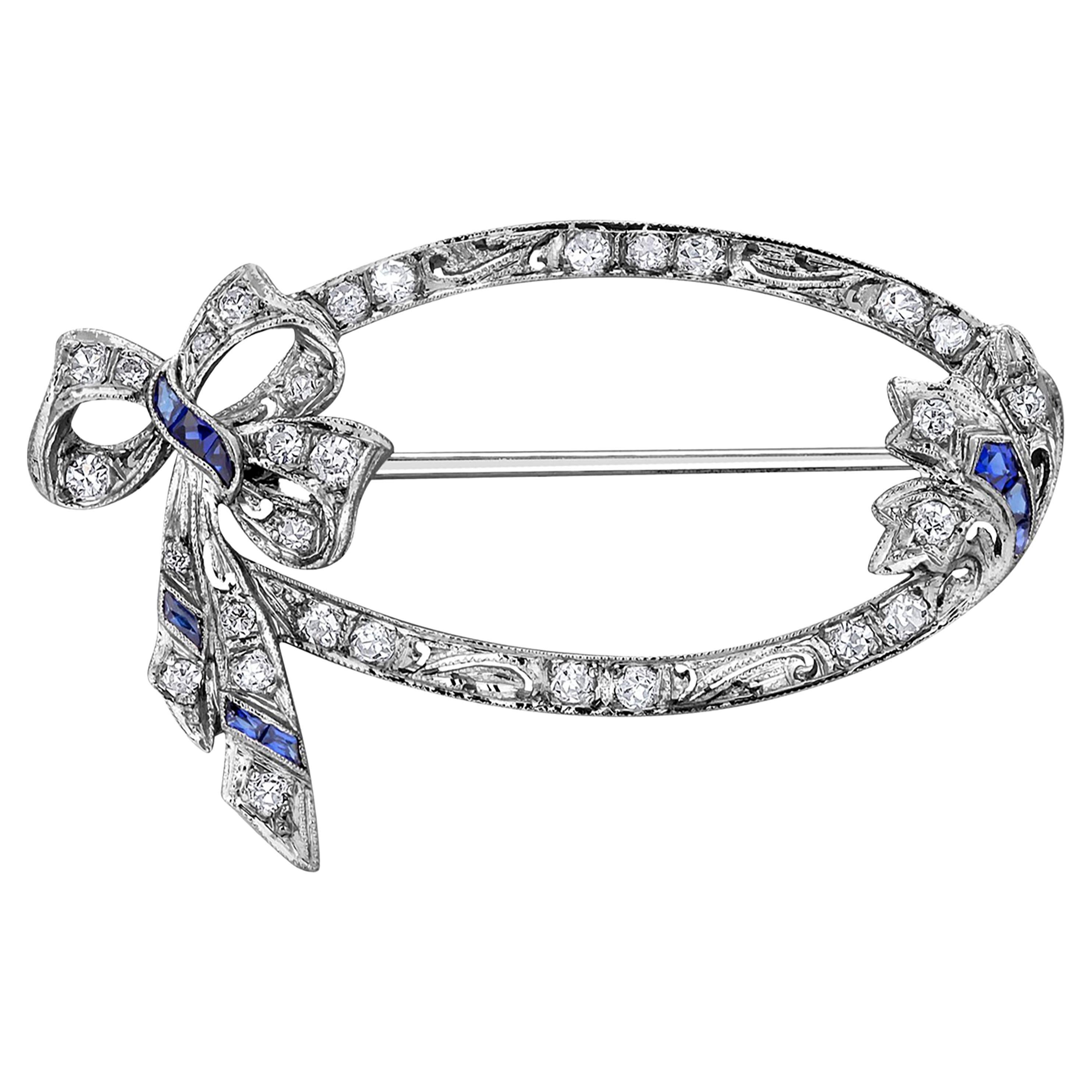 Art Deco Sapphire Diamond Platinum Hand Engraved Millgrain Bow 1.30 Inch Brooch For Sale