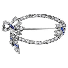Art Deco Sapphire Diamond Platinum Hand Engraved Millgrain Bow 1.30 Inch Brooch