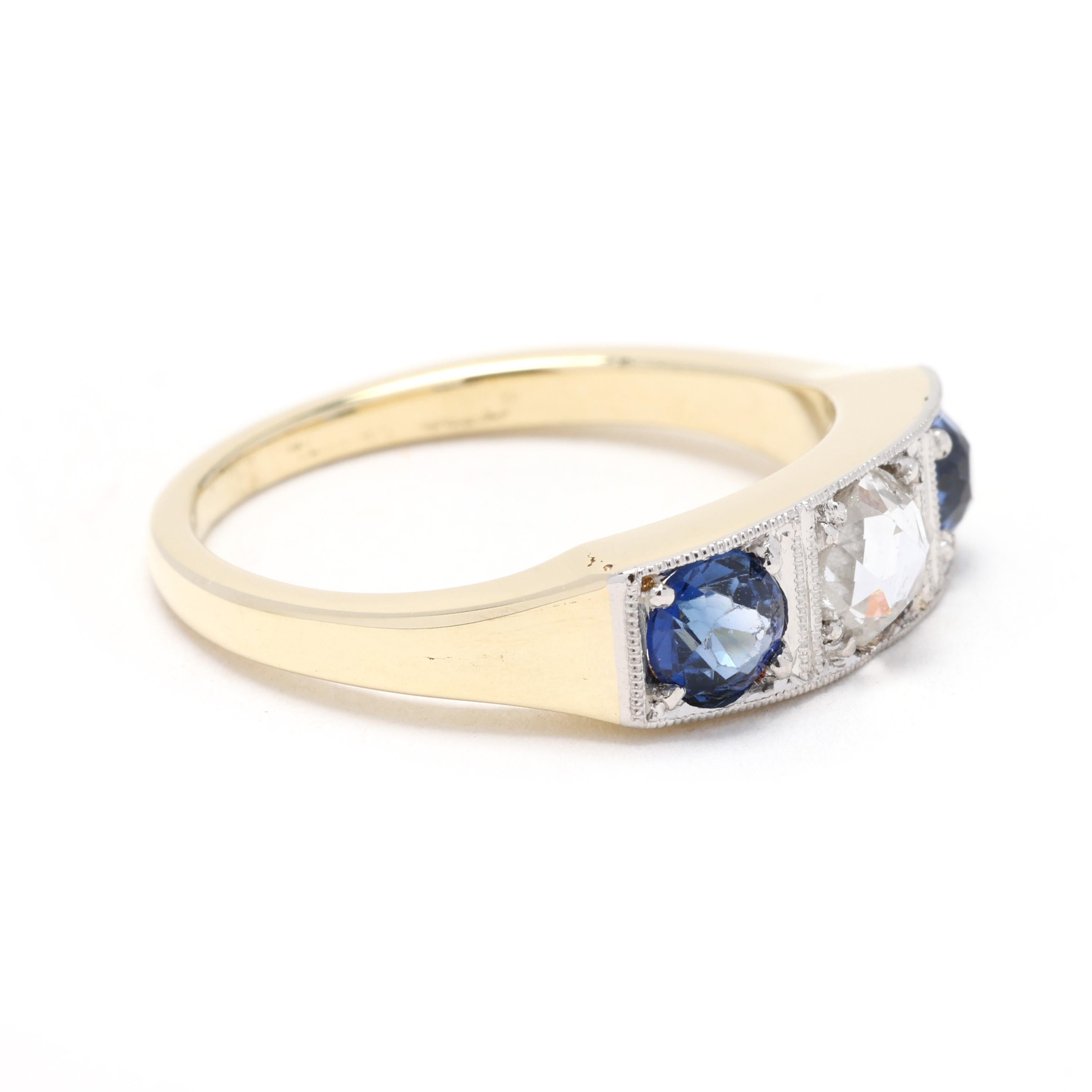 Step into the elegance of the Art Deco era with this stunning sapphire and diamond ring, crafted in luxurious 14k yellow gold. This size 5 ring features a captivating sapphire center stone accented by sparkling diamonds in an intricate Art Deco