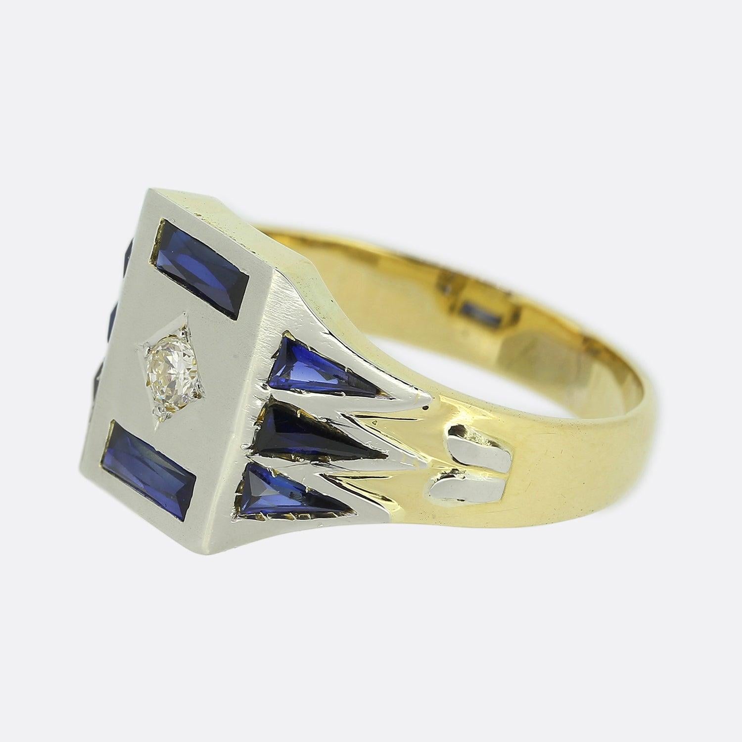 Here we have a marvellous sapphire and diamond signet ring crafted at a time when the Art Deco style was at the height of design. A single round faceted old European cut diamond sits at the centre of a rectangular platinum face with a single