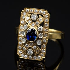 Bague de style Art déco en or 18 carats avec saphirs et diamants