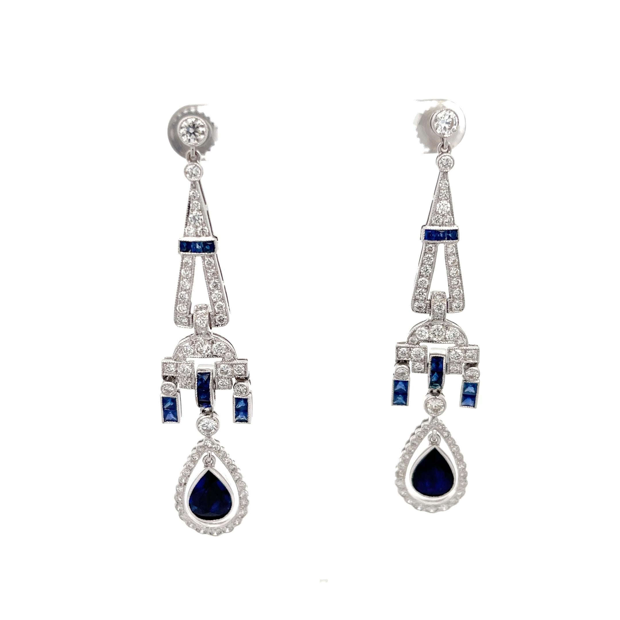 Art Deco Sapphire and Diamond Dangle Earrings in 18K White Gold. The earrings feature near colorless round diamonds, pear shape and square cut sapphires. Comes with GIA report. 
2.75