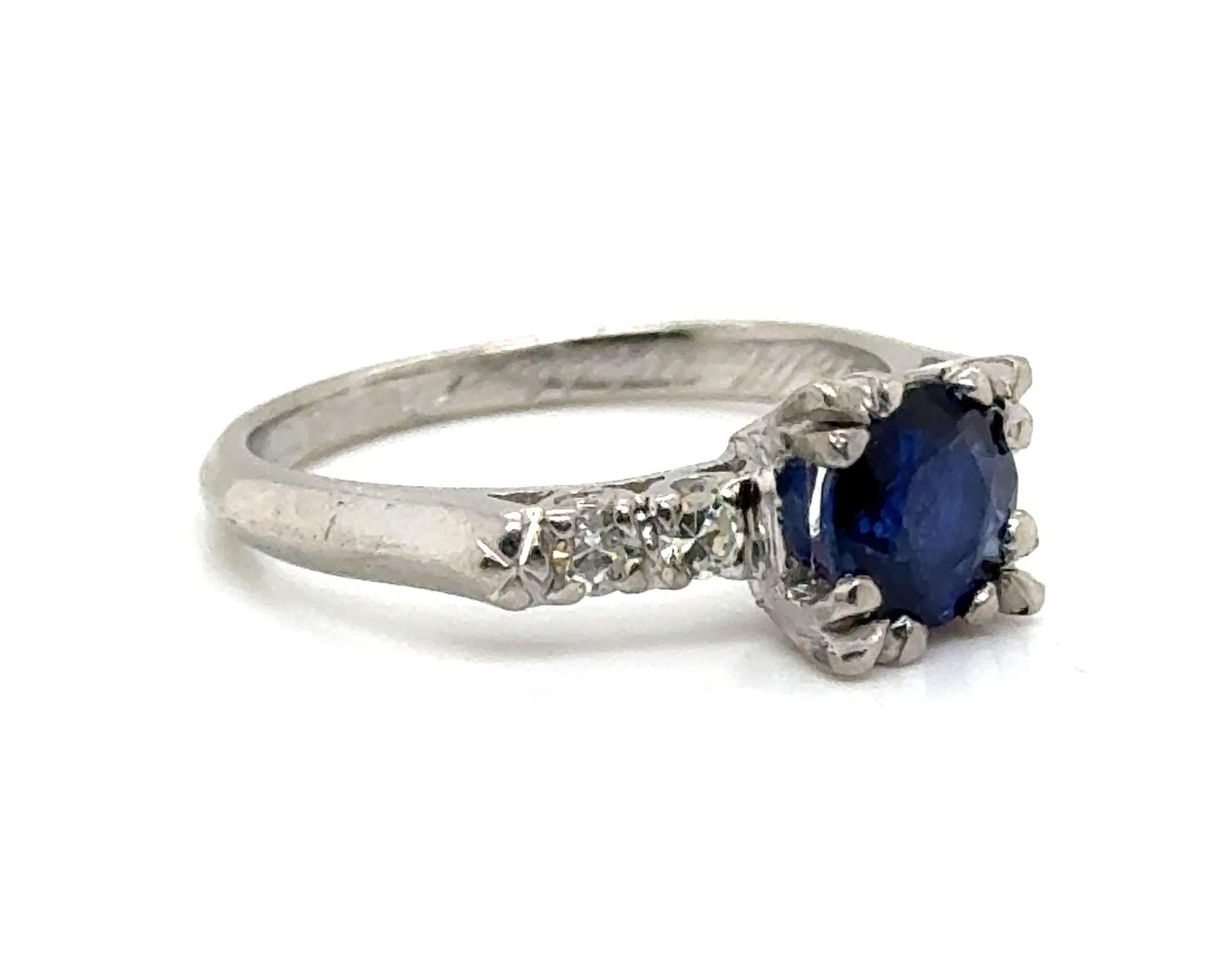 Genuine Original Art Deco Antique Dated 3-14-1940 Vintage Sapphire Diamond Ring 1.21ct Round Platinum


Showcasing a Captivating Centerpiece, this Piece Features a Genuine Natural Round Blue Sapphire with a Substantial Weight of 1.05