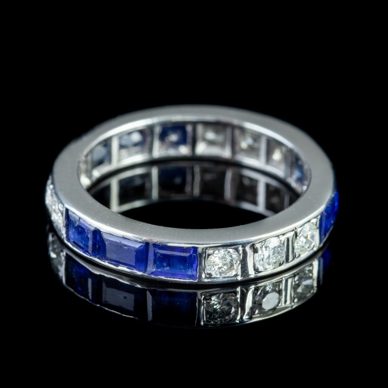 A beautiful Art Deco full eternity ring modelled in Platinum and set with over 1.35ct of blue baguette cut Sapphires with trilogies of old brilliant cut Diamonds in-between, approx. 0.75ct in total. 

Eternity rings have been given as a love token