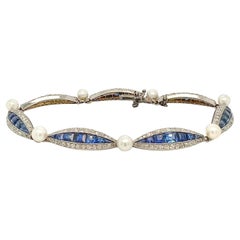 Bracciale Art Deco con zaffiro, diamante, perla, platino e oro