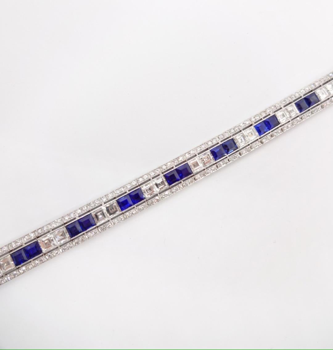 A gorgeous classic line bracelet features alternating pairs of square cut diamonds with vivid bright royal blue square dut sapphires, bordered on each side by a single row of old european cut diamonds all bead-set to perfection! c1930
We estimate