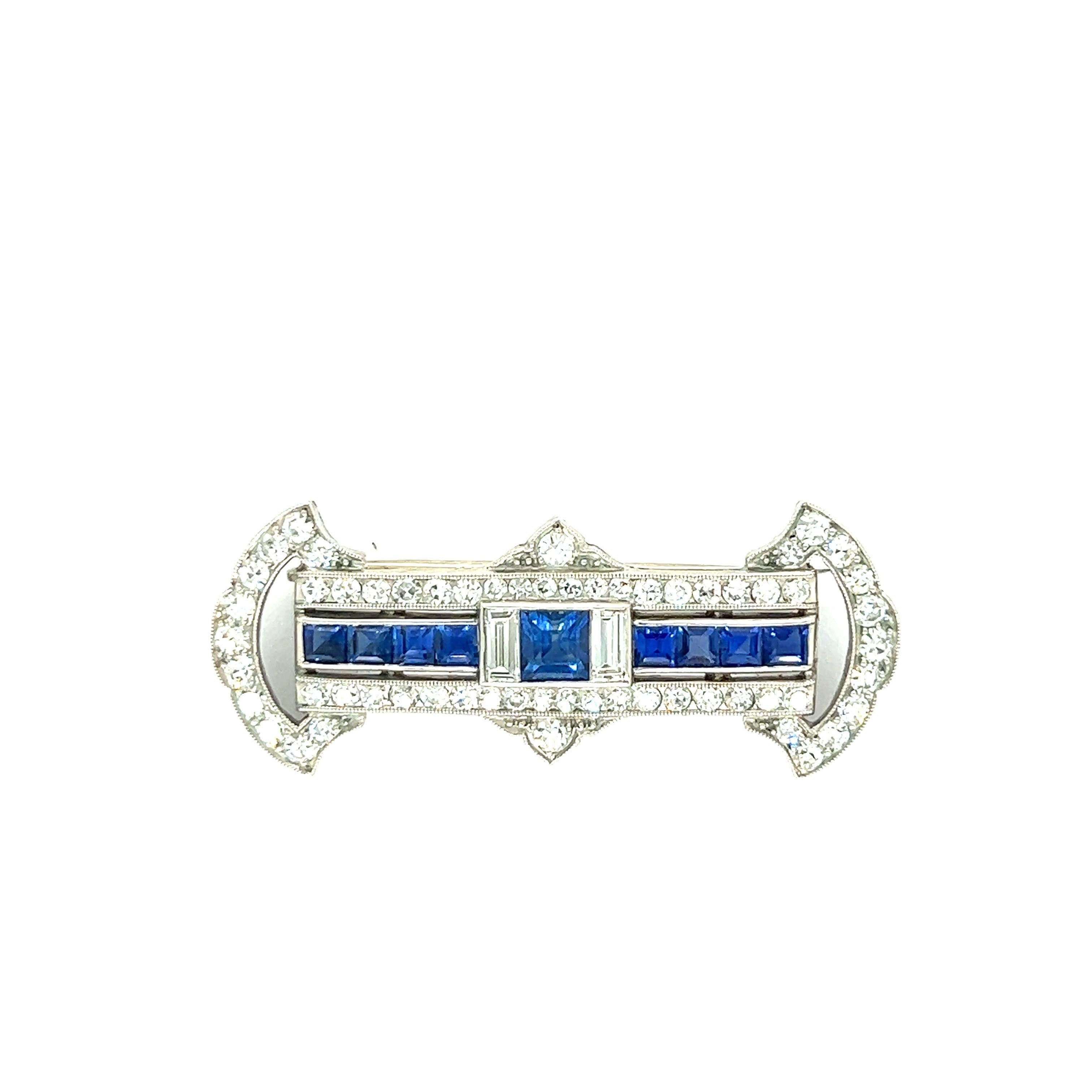 Art Deco Sapphire Diamond Platinum Pin Brooch

Square-shaped sapphires, with baguette-cut diamonds and a single-cut diamond border of approximately 1 carat total; set in platinum 

Size: width 3.5 cm, length 1.4 cm
Total weight: 6.4 grams
