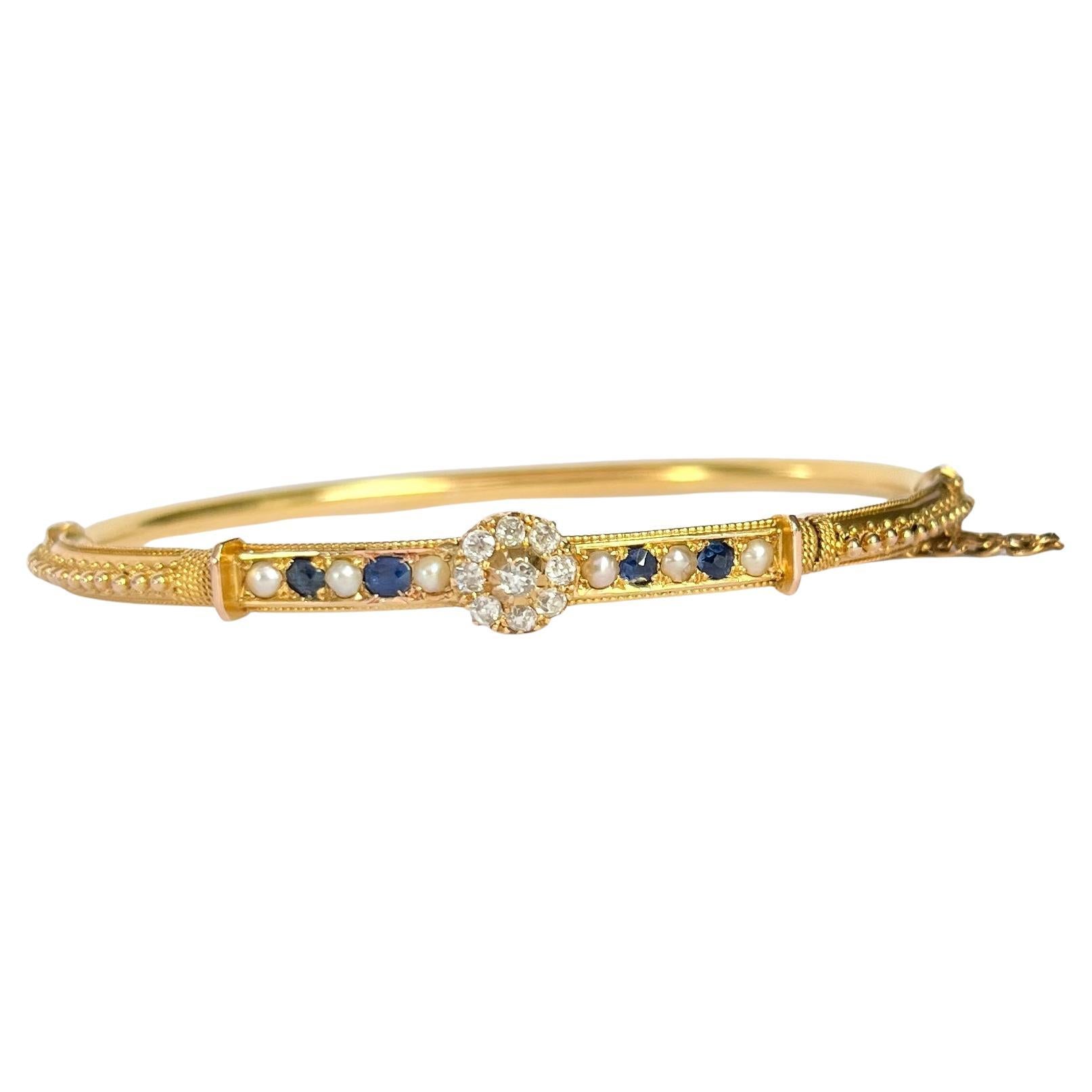 Bracelet jonc Art déco en or 18 carats avec saphirs, perles et diamants en vente