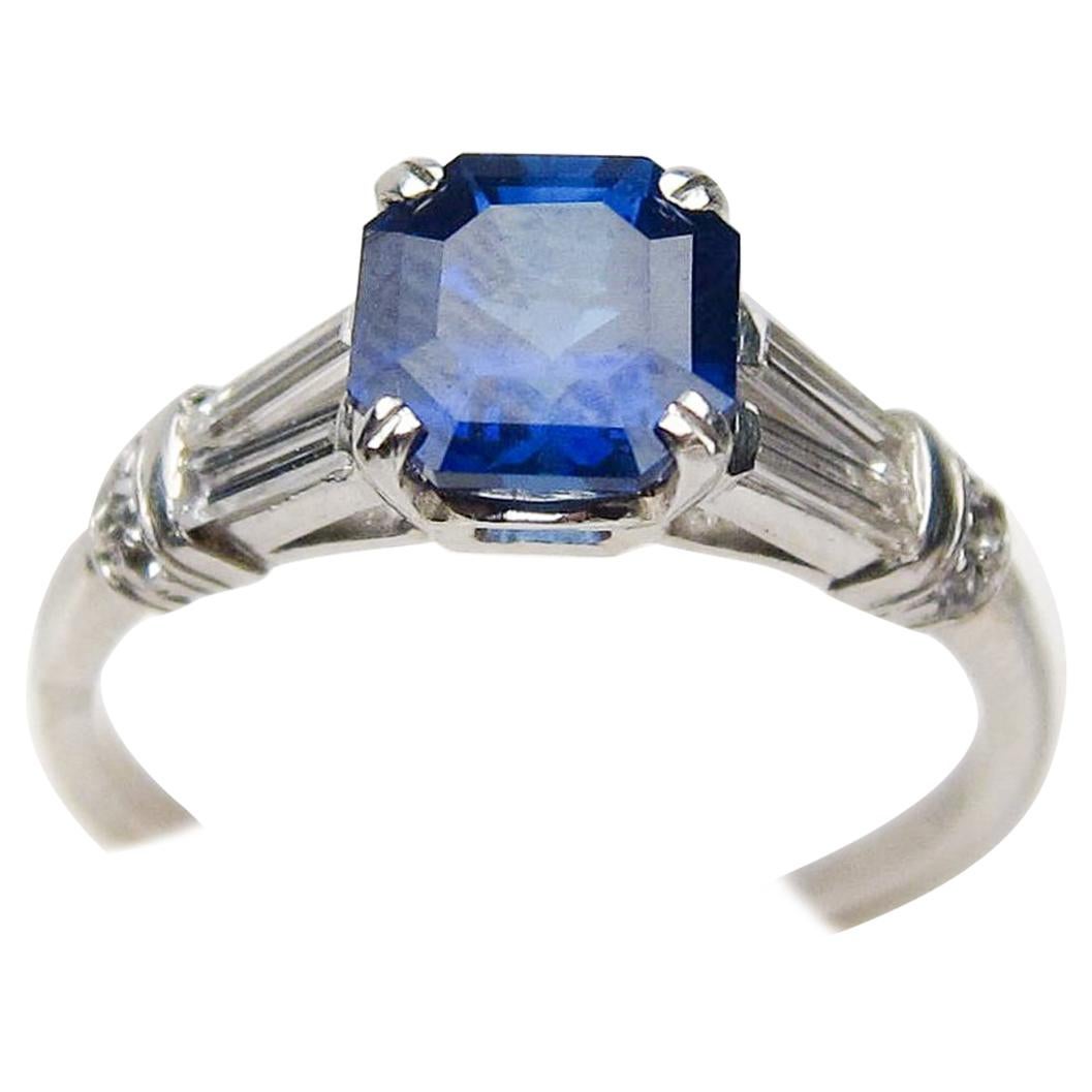 Art Deco Sapphire Platinum Ring with Baguette Diamond Accents For Sale