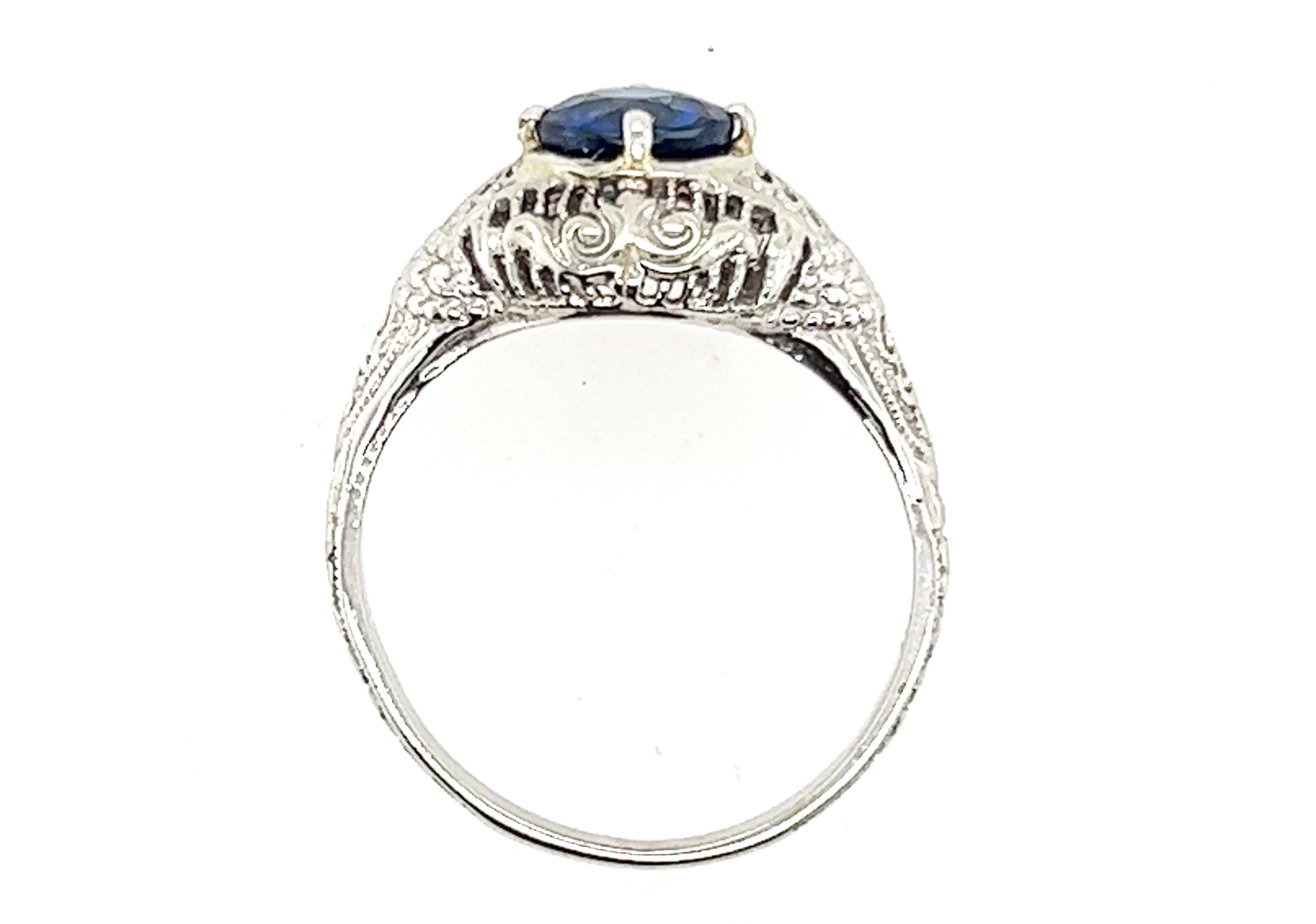 Genuine Original Art Deco Antique from 1930's Sapphire 18K White Gold Solitaire Ring  1.14ct


Featuring a Gorgeous Natural Blue Sapphire at 1.14ct Carat Weight

Crisp Filigree, Engraved Pattern on Shank 

Perfect Alternative Engagement Ring

100%