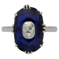 Antique Art Deco sapphire ring with diamond set centre, circa 1920.