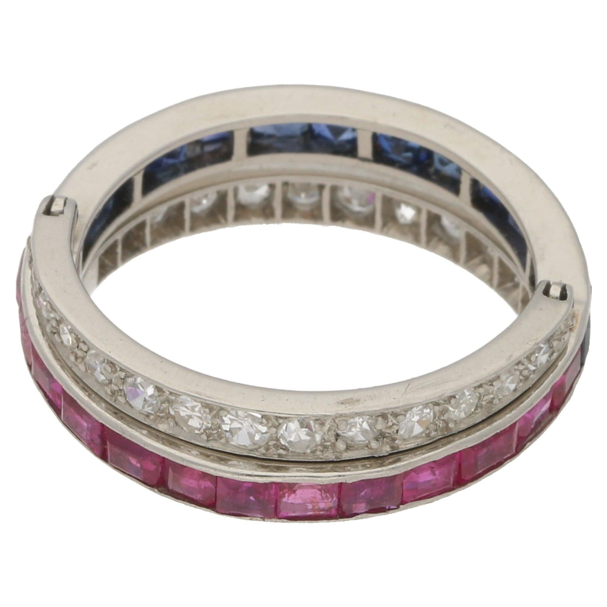 An early 1930’s sapphire, ruby and diamond convertible flip ring set in platinum. 

This piece is an excellent example of the Art Deco style, period and craftsmanship. Firstly the band is invisibly set with red-pinkish rubies and royal blue